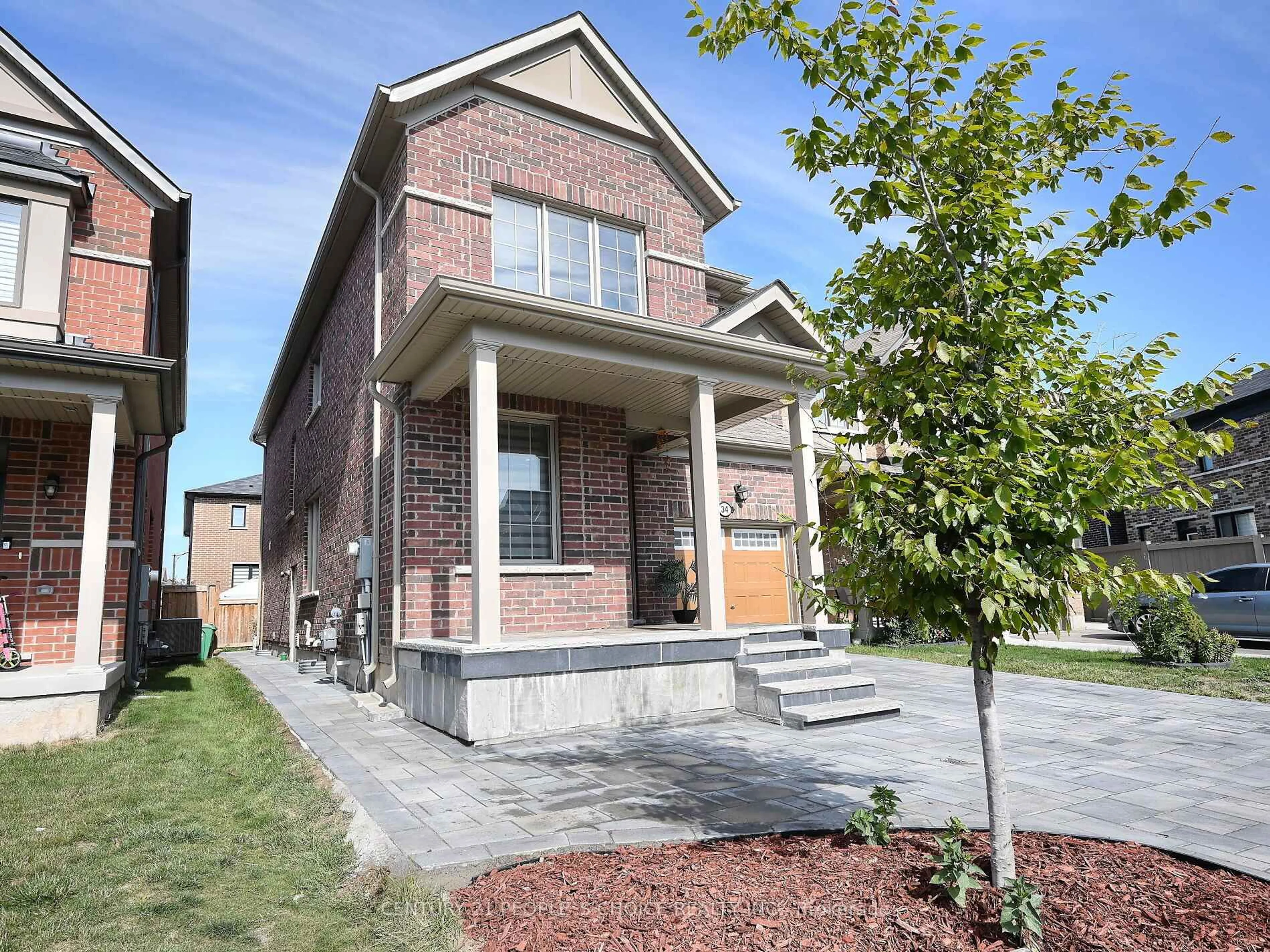 Home with brick exterior material, street for 34 Cyclone Tr, Brampton Ontario L7A 5E7