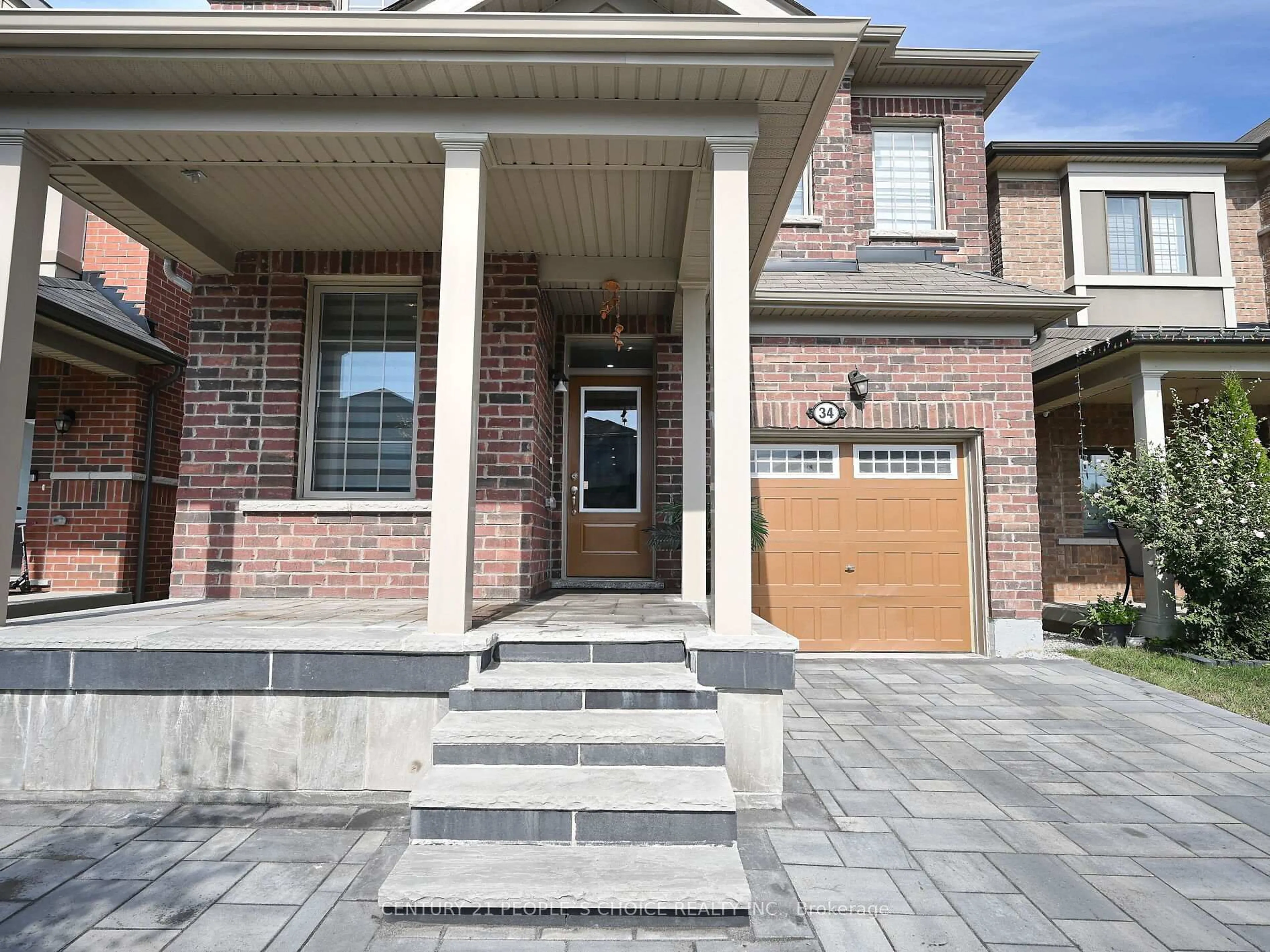 Home with brick exterior material, street for 34 Cyclone Tr, Brampton Ontario L7A 5E7