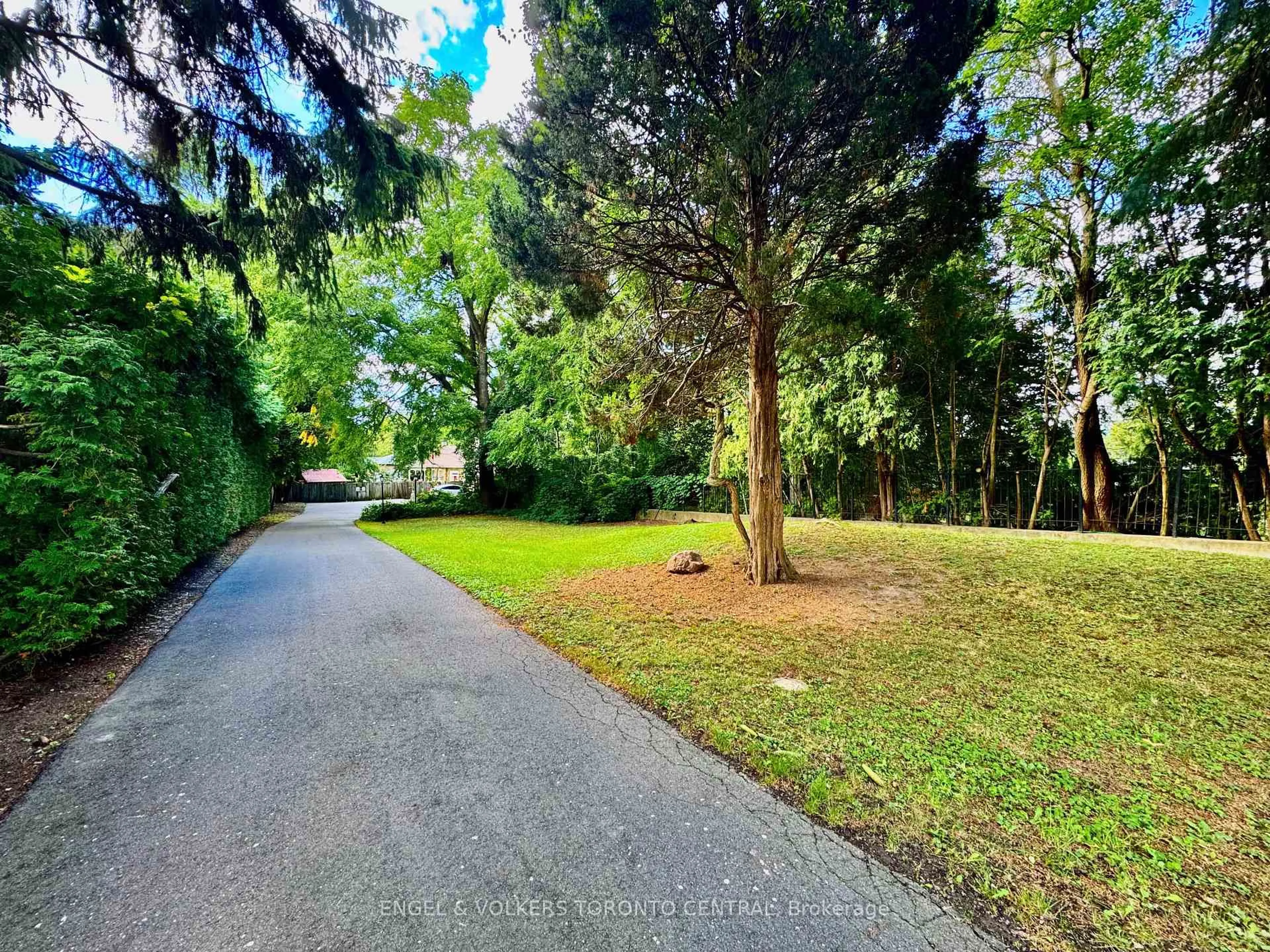 A pic from outside/outdoor area/front of a property/back of a property/a pic from drone, forest/trees view for 85 Yorkleigh Ave, Toronto Ontario M9P 1Y3