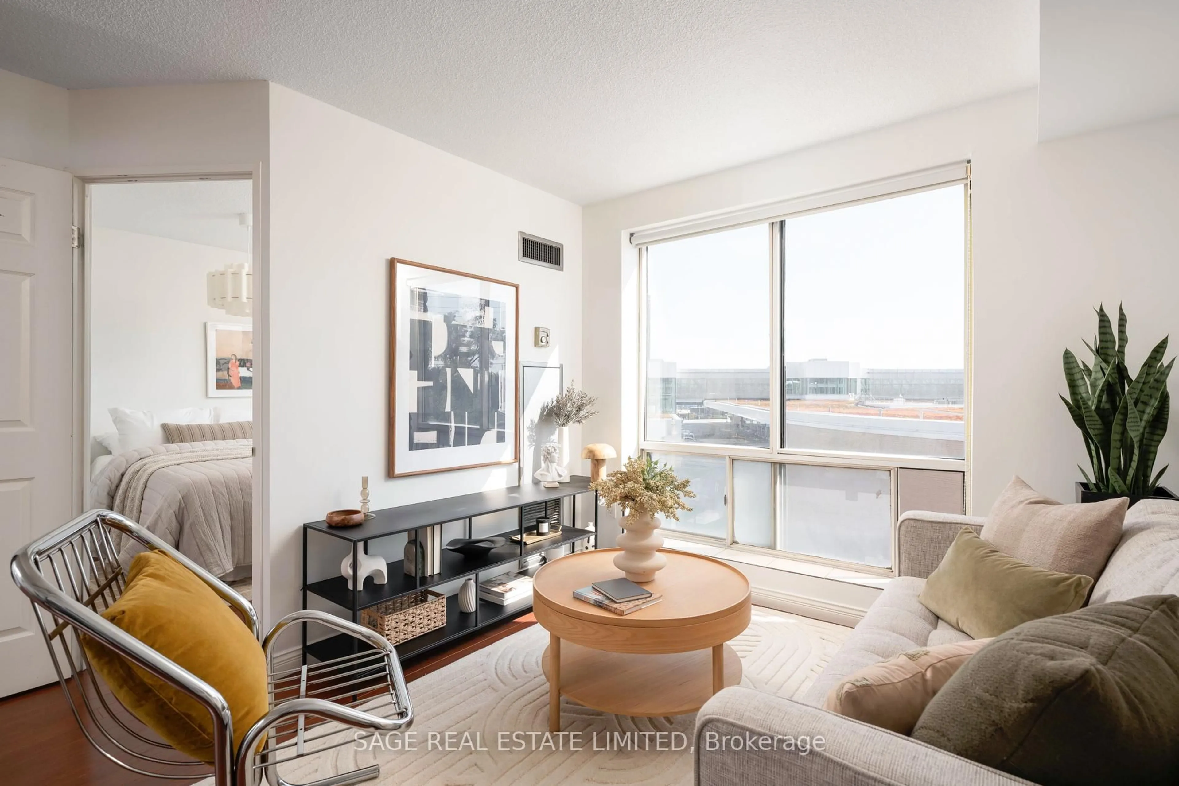 Living room with furniture, unknown for 101 Subway Cres #205, Toronto Ontario M9B 6K4