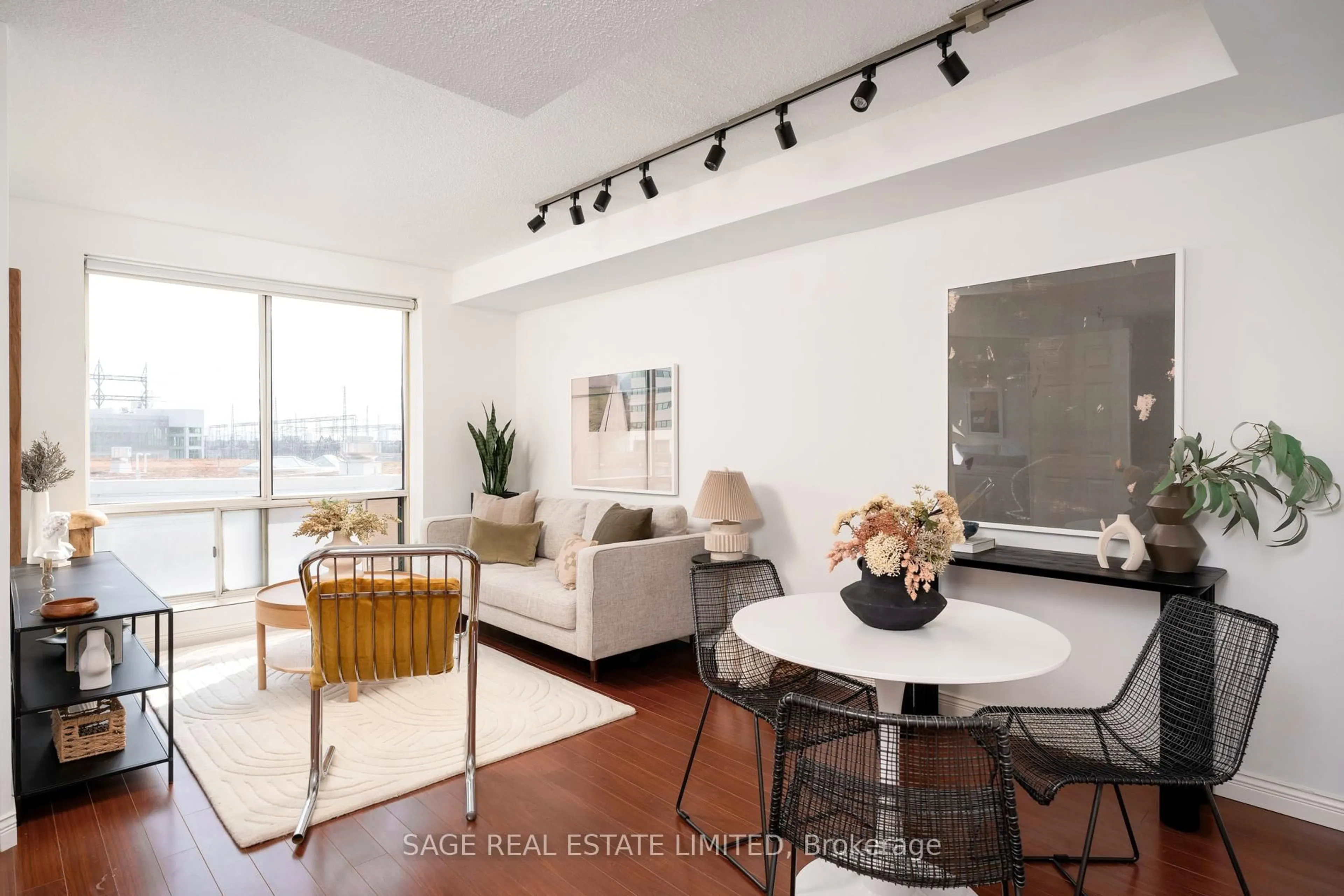 Living room with furniture, unknown for 101 Subway Cres #205, Toronto Ontario M9B 6K4
