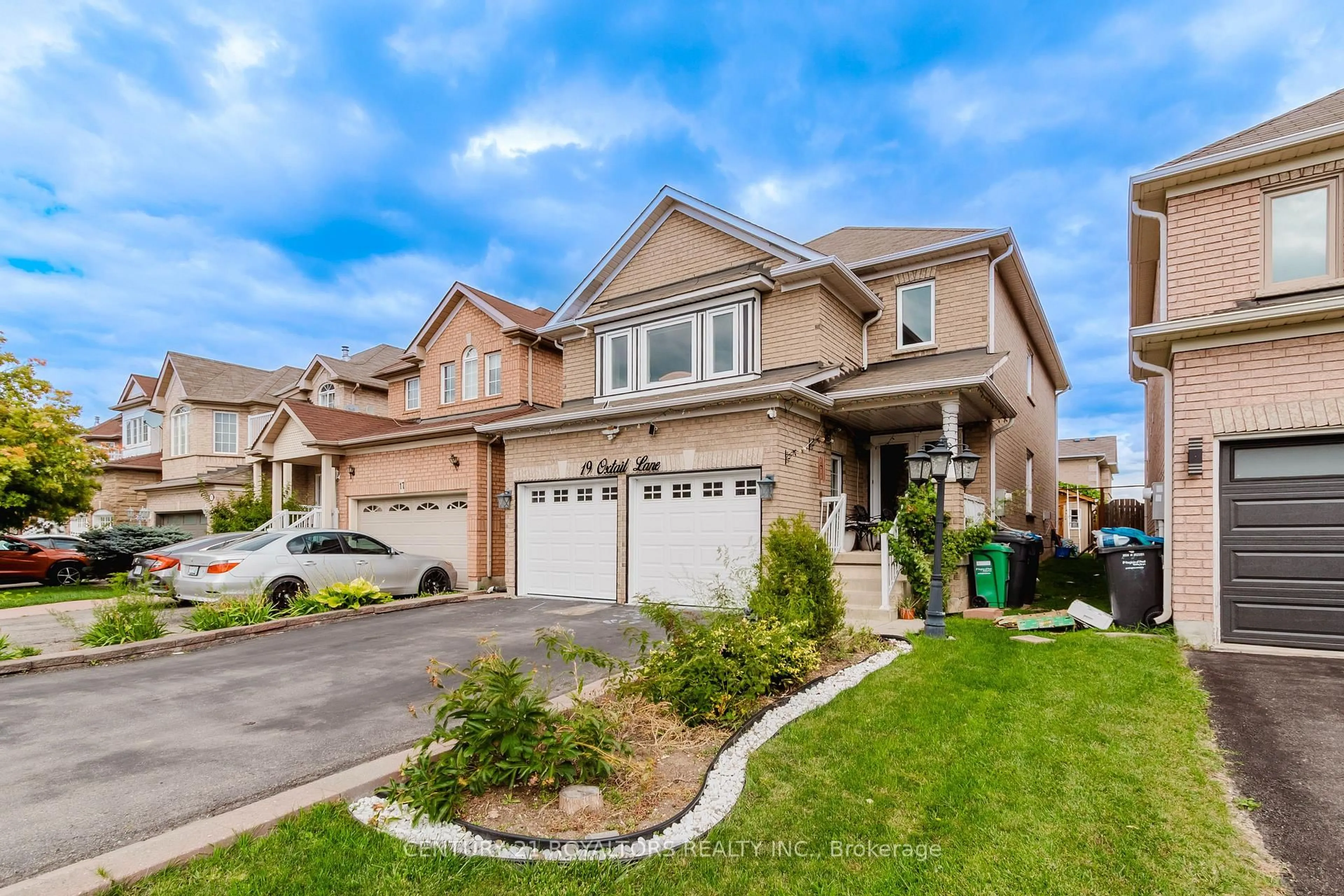 Home with brick exterior material, street for 19 OXTAIL Lane, Brampton Ontario L6X 5E2