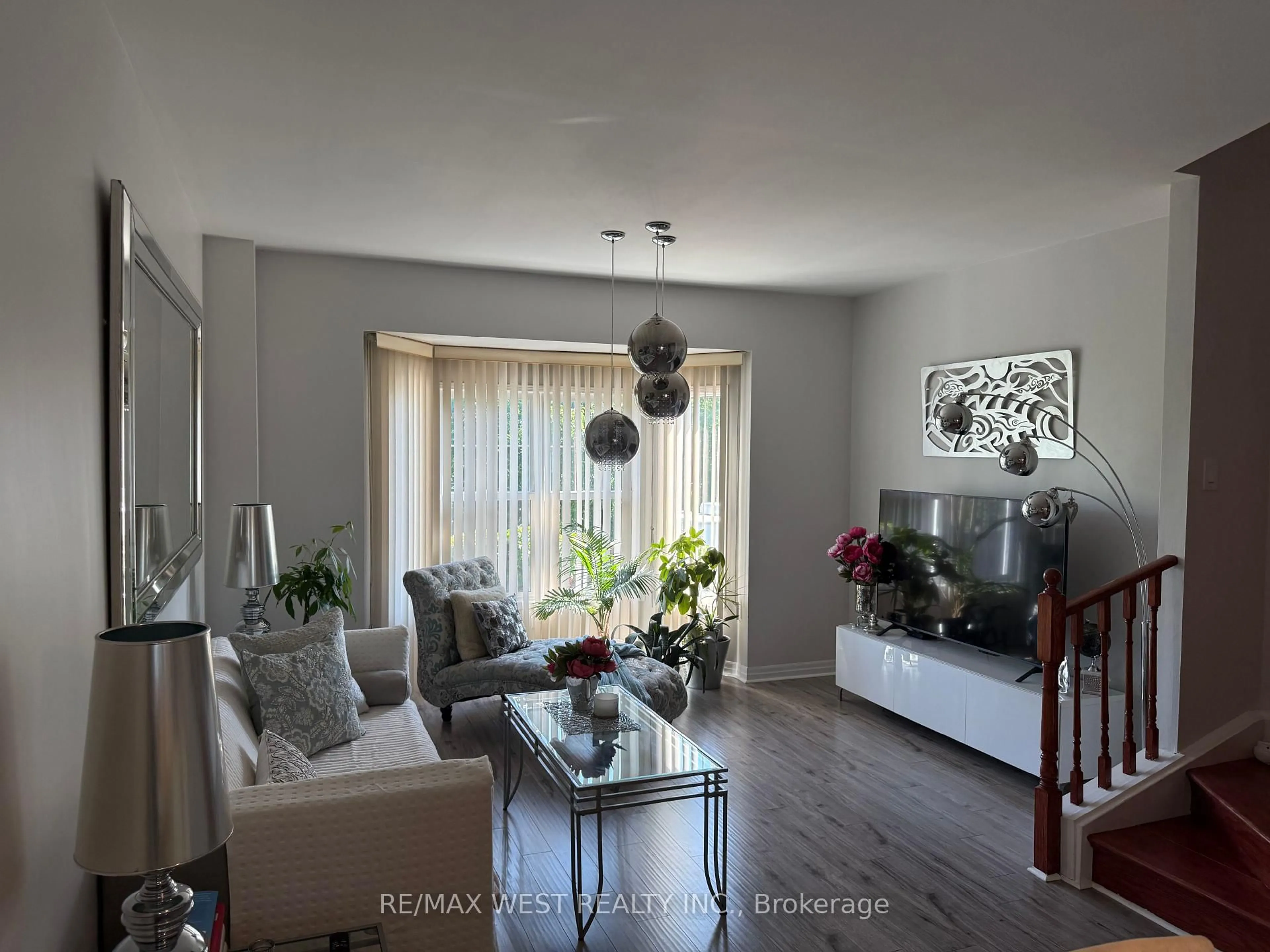 Living room with furniture, wood/laminate floor for 630 Evans Ave #22, Toronto Ontario M8W 2W6