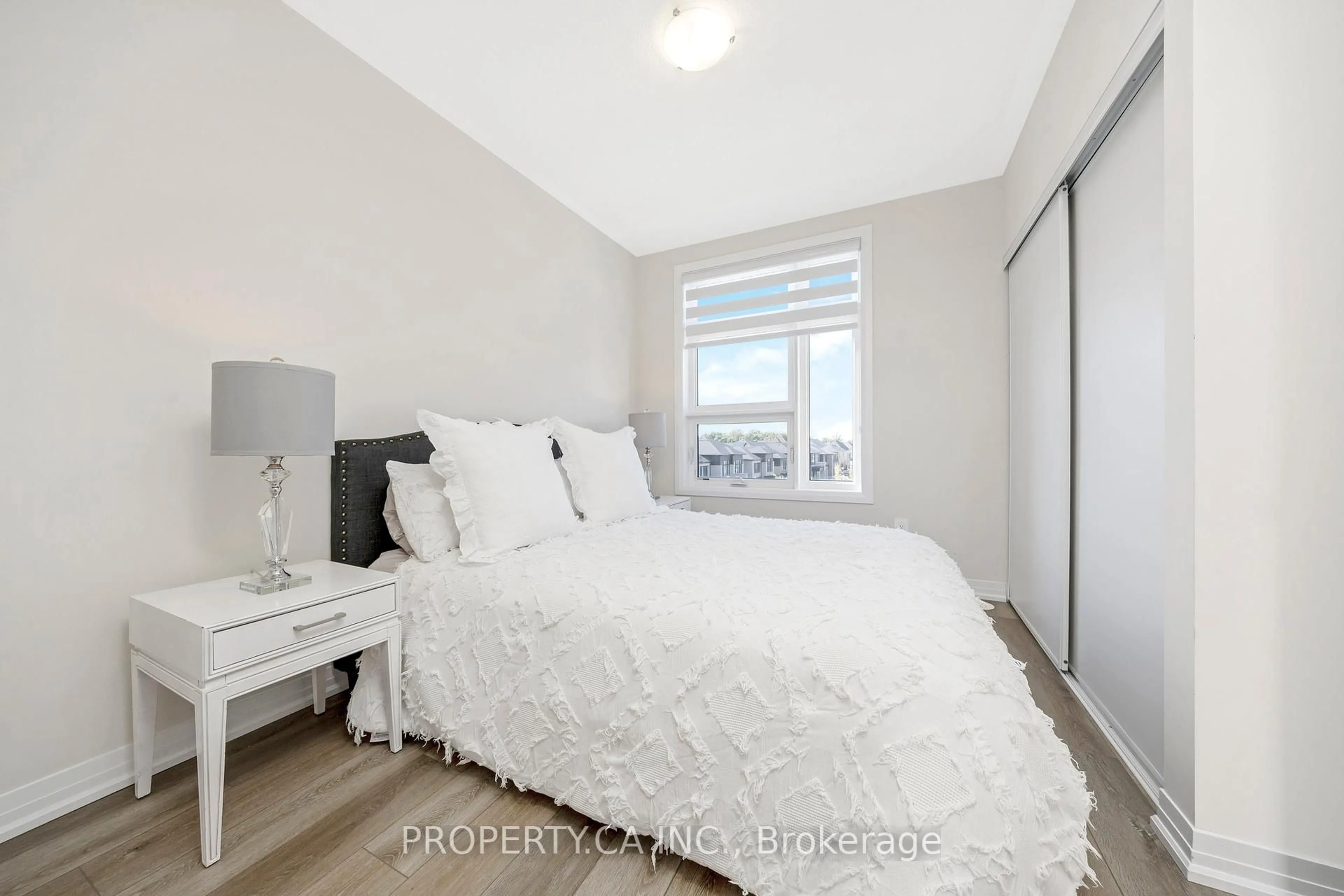 Bedroom with bed, unknown for 1569 Rose Way #119, Milton Ontario L9E 1N4