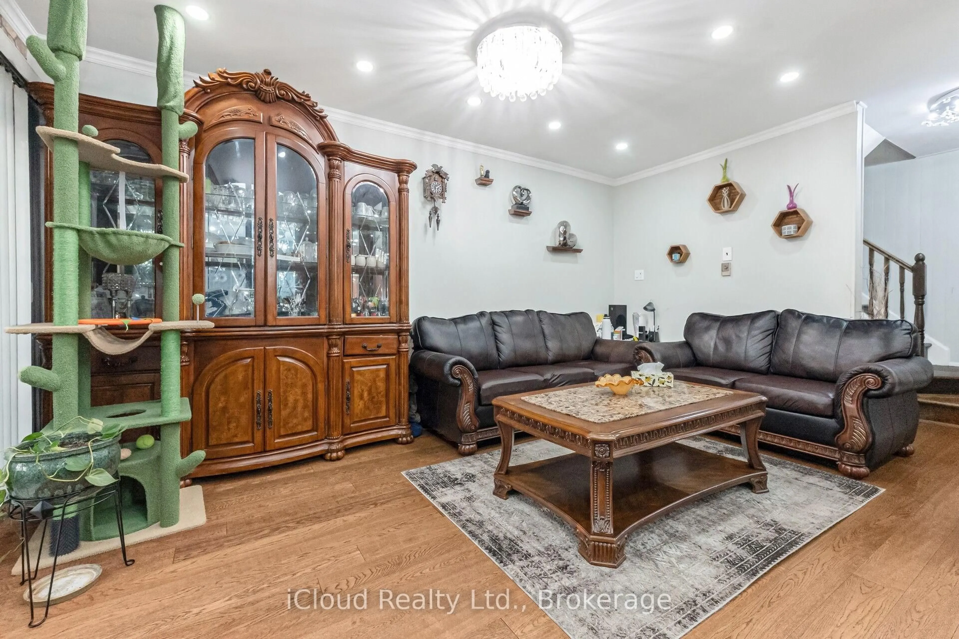 Living room with furniture, wood/laminate floor for 40 Rabbit Lane #10, Toronto Ontario M9B 5S6