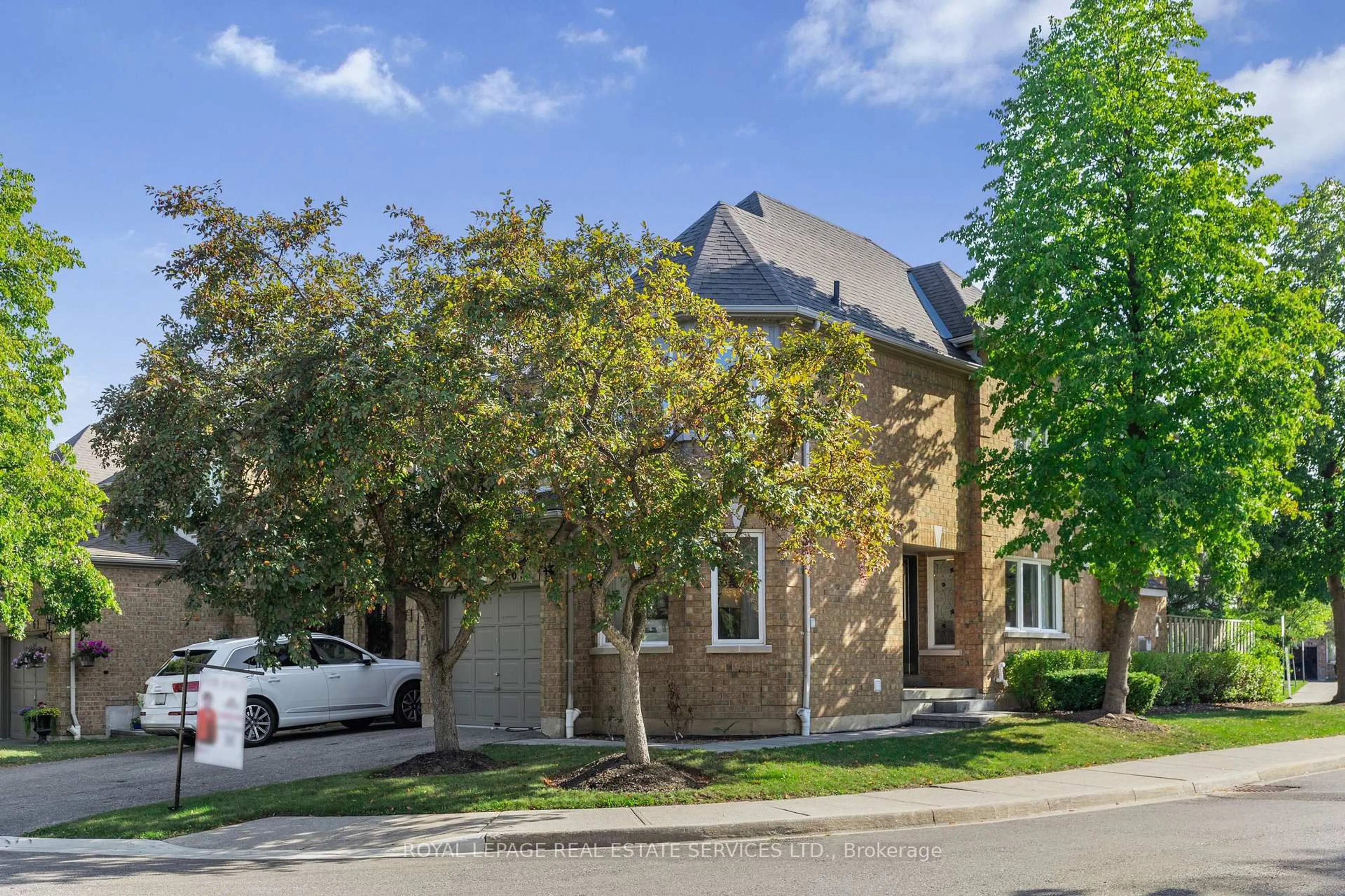 Home with brick exterior material, street for 5230 Glen Erin Dr #63, Mississauga Ontario L5M 5Z7