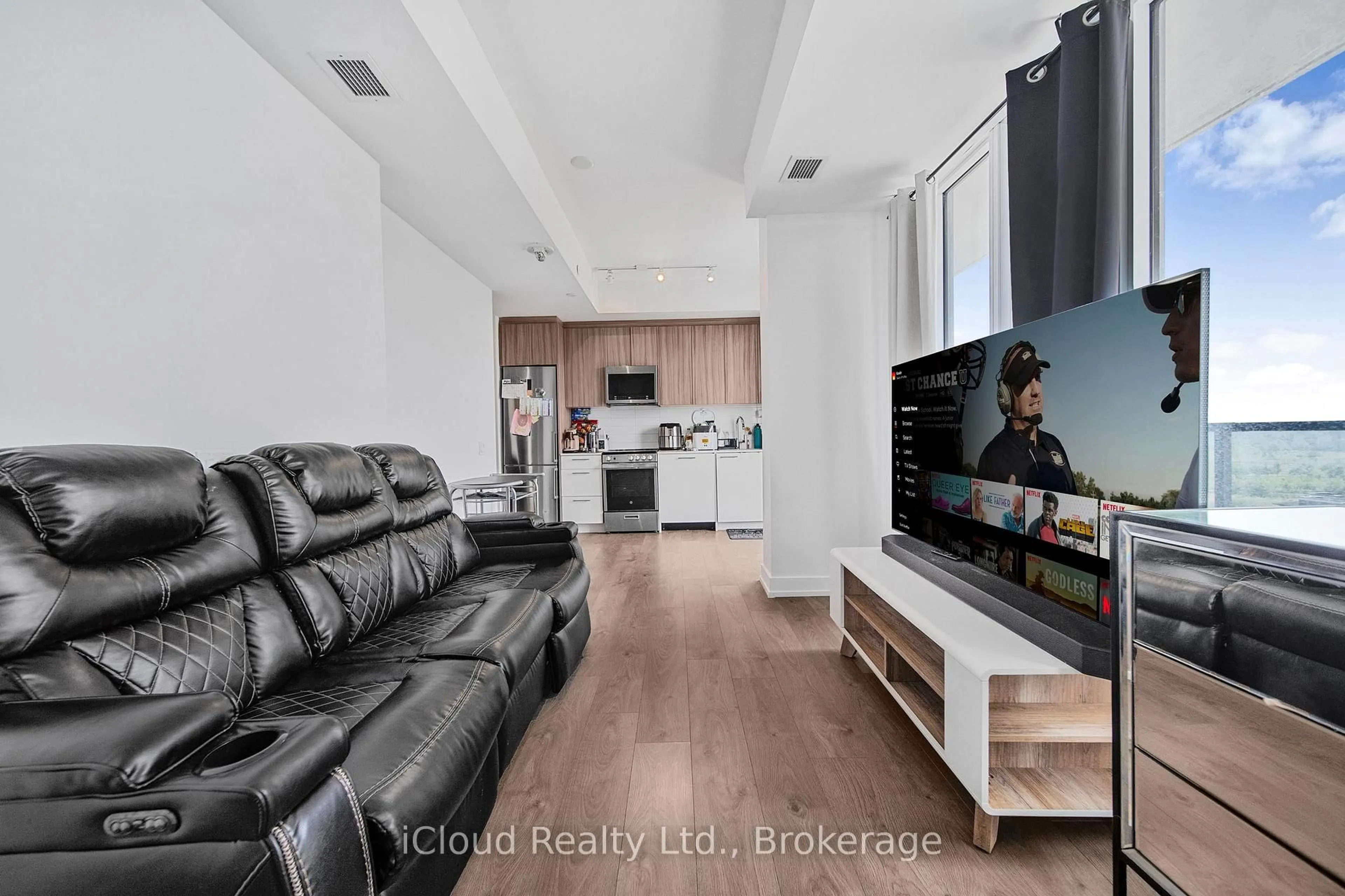 Living room with furniture, unknown for 215 Veterans Dr #709, Brampton Ontario L7A 4S6