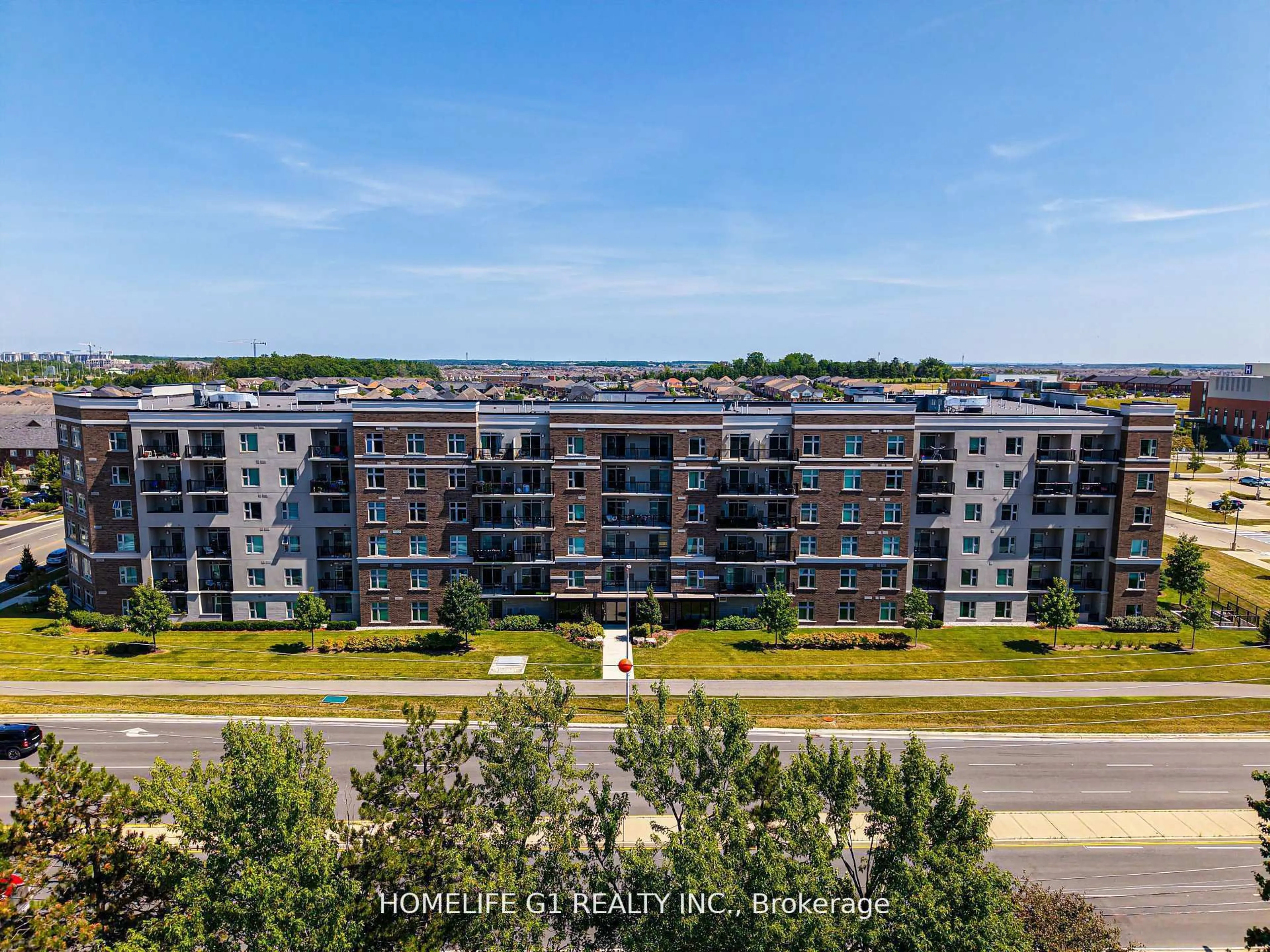 A pic from outside/outdoor area/front of a property/back of a property/a pic from drone, city buildings view from balcony for 610 Farmstead Dr #215, Milton Ontario L9T 8X5
