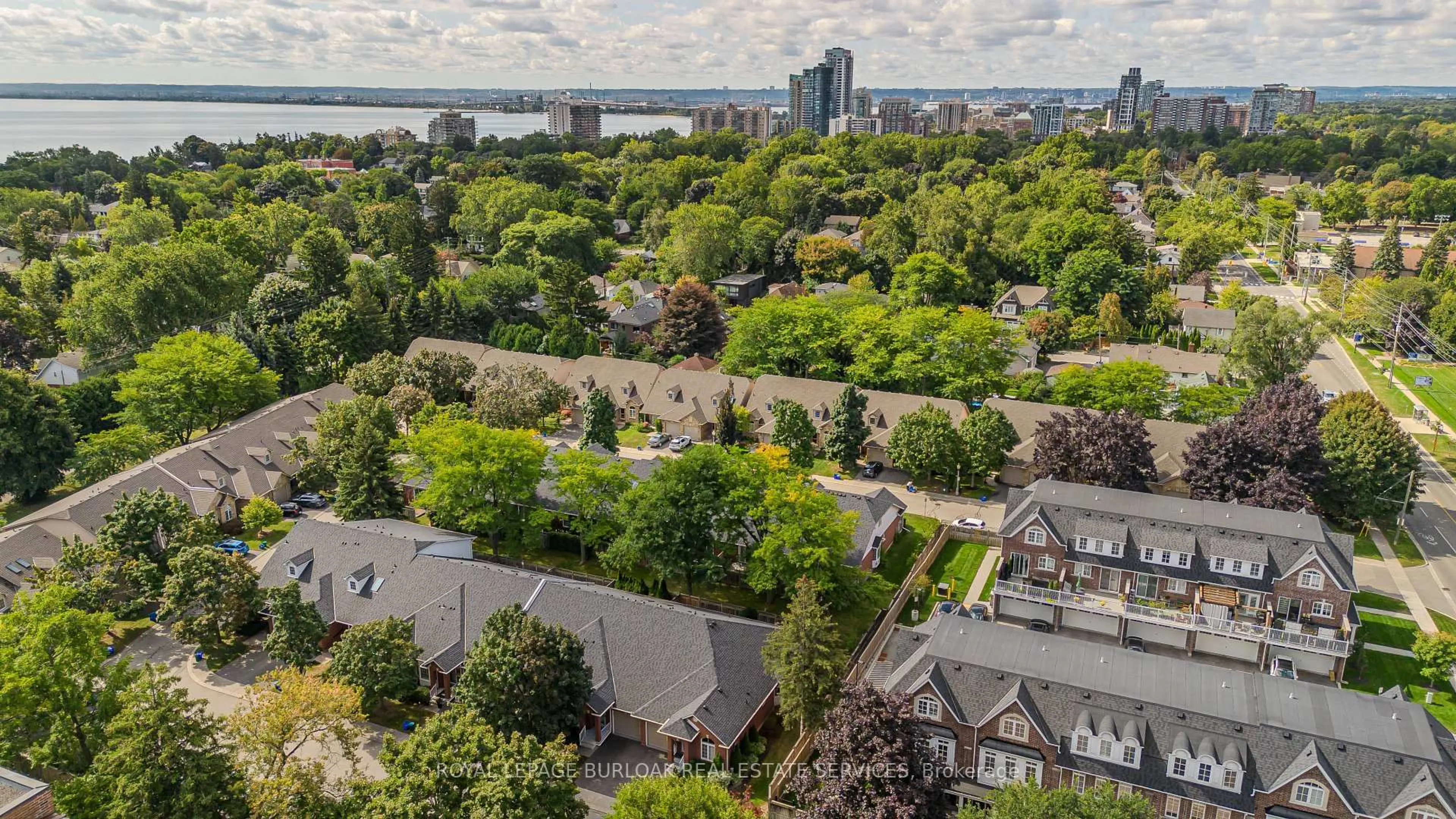 A pic from outside/outdoor area/front of a property/back of a property/a pic from drone, city buildings view from balcony for 2350 New St #34, Burlington Ontario L7R 4P8