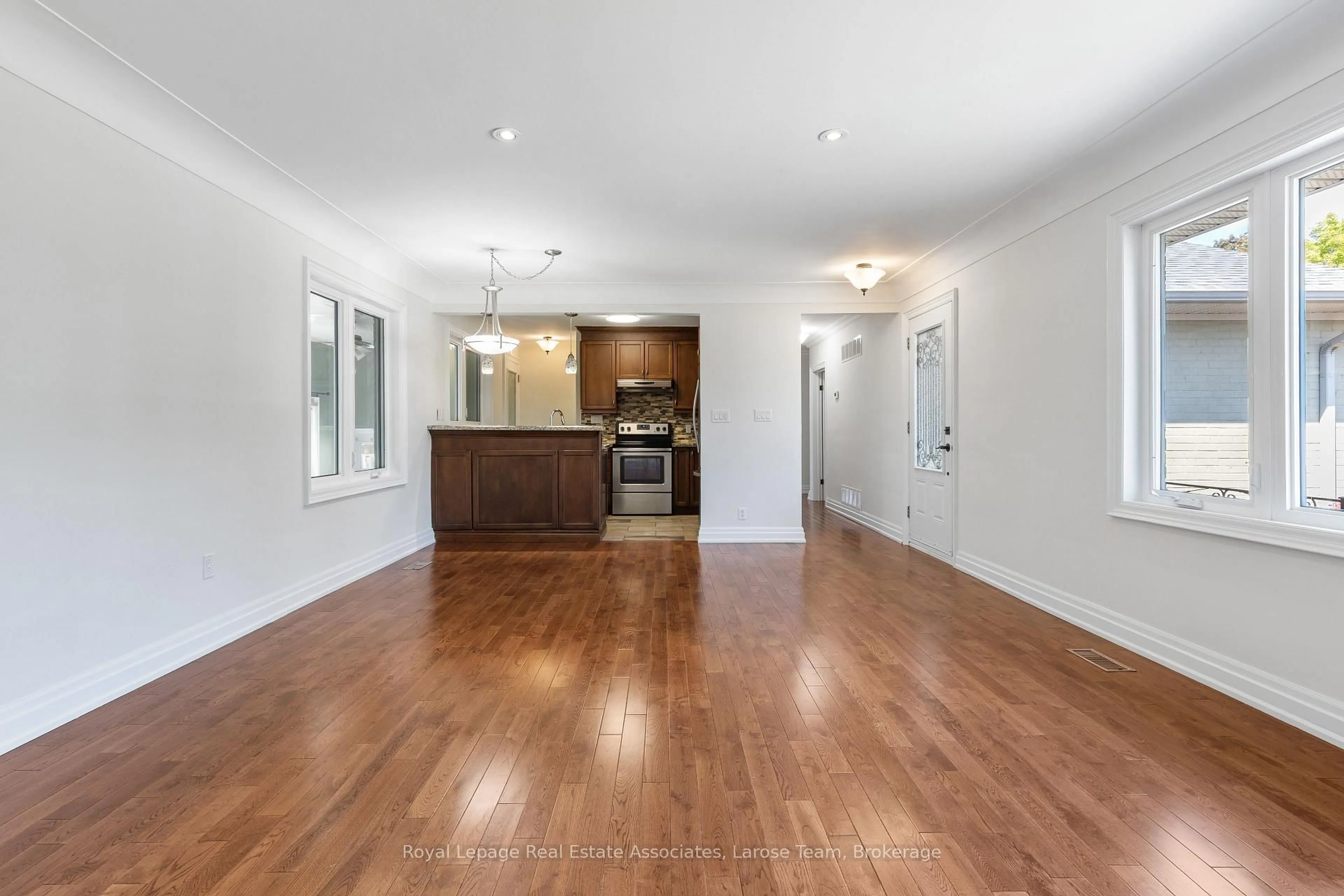 Open concept kitchen, wood/laminate floor for 236 Woodale Ave, Oakville Ontario L6K 2N2