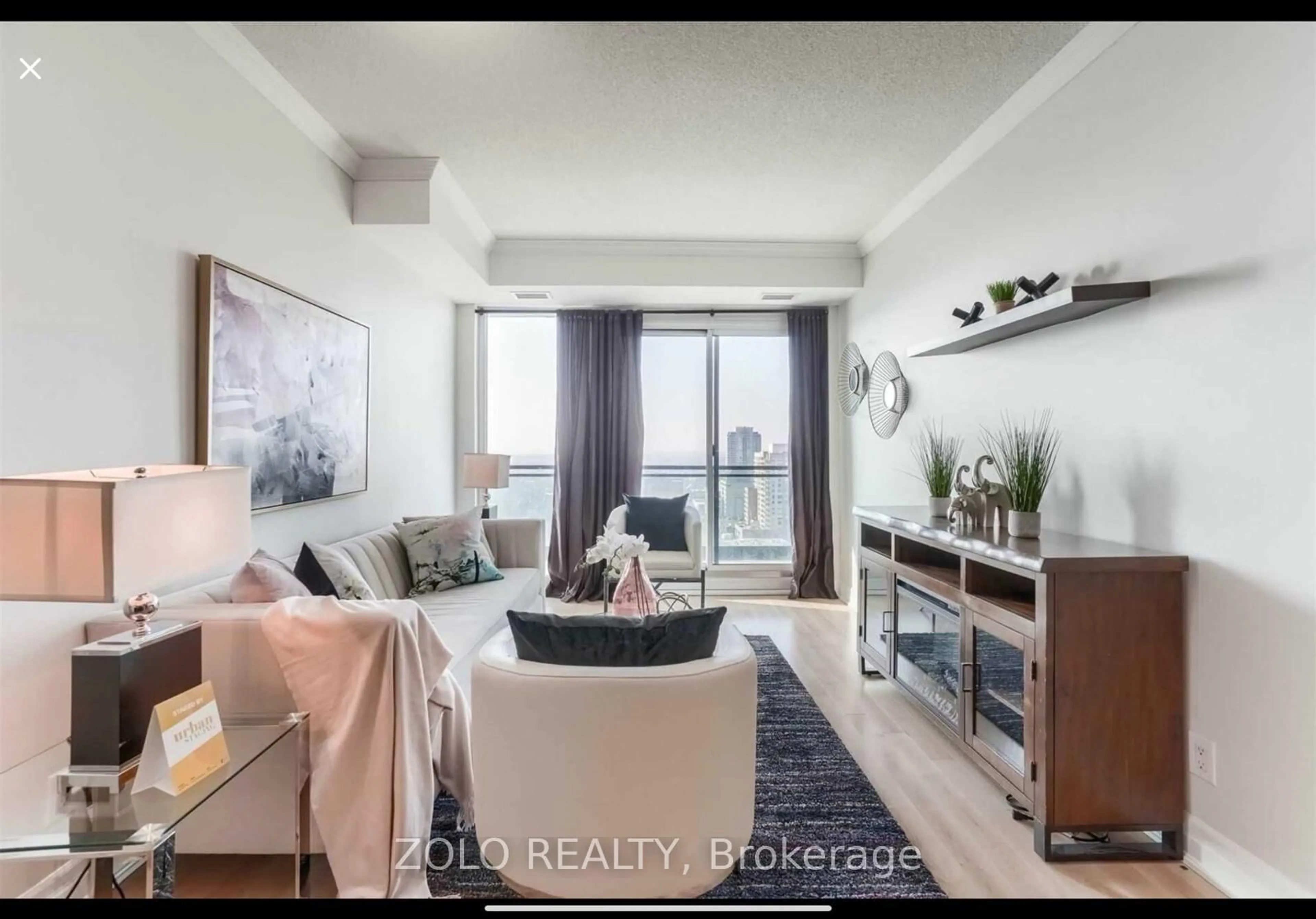 Living room with furniture, wood/laminate floor for 100 John St #1905, Brampton Ontario L6W 0A8