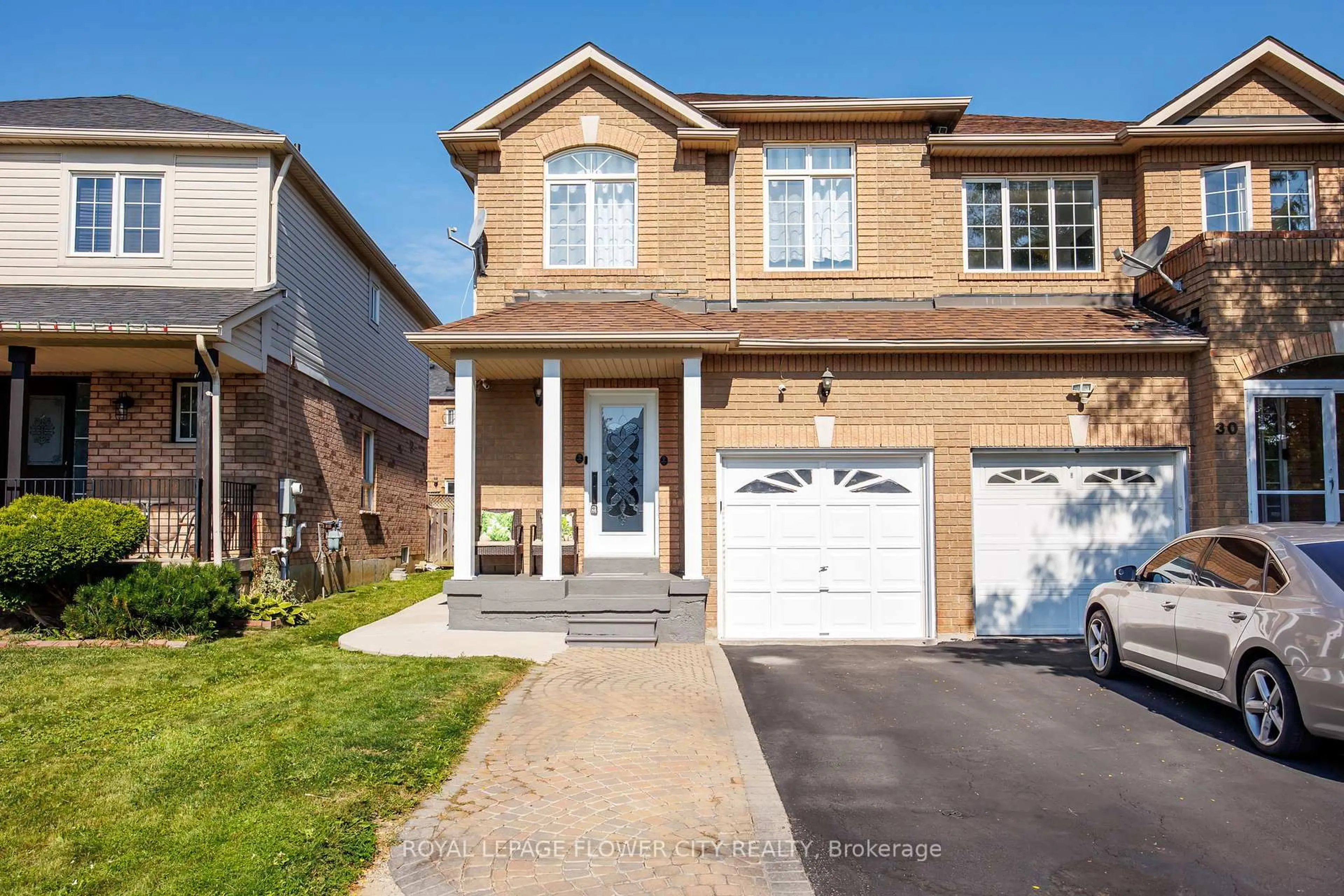 Home with brick exterior material, street for 28 Bearwood St, Brampton Ontario L7A 1Y8