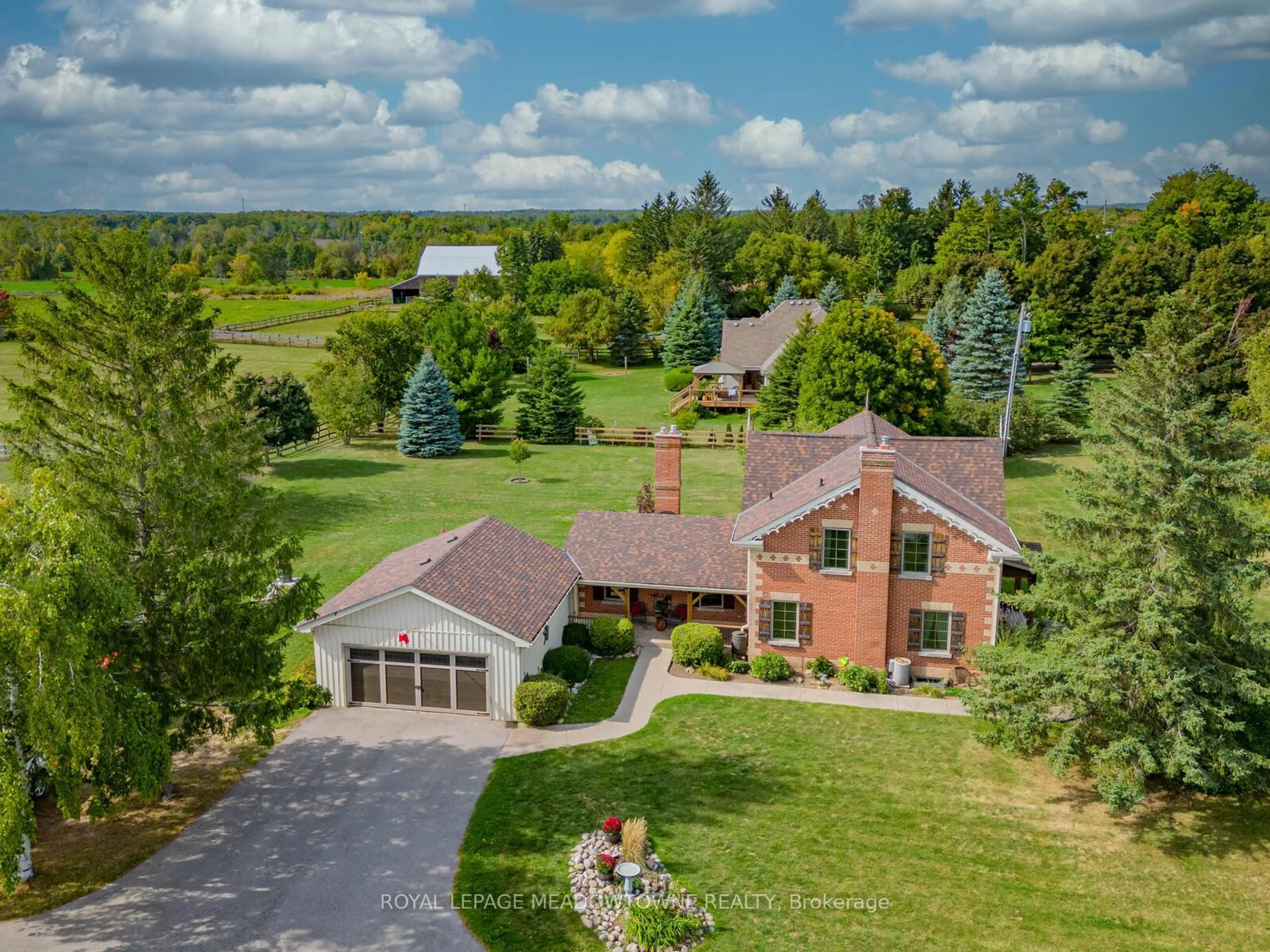 A pic from outside/outdoor area/front of a property/back of a property/a pic from drone, unknown for 14214 Eighth Line, Halton Hills Ontario L7G 4S4