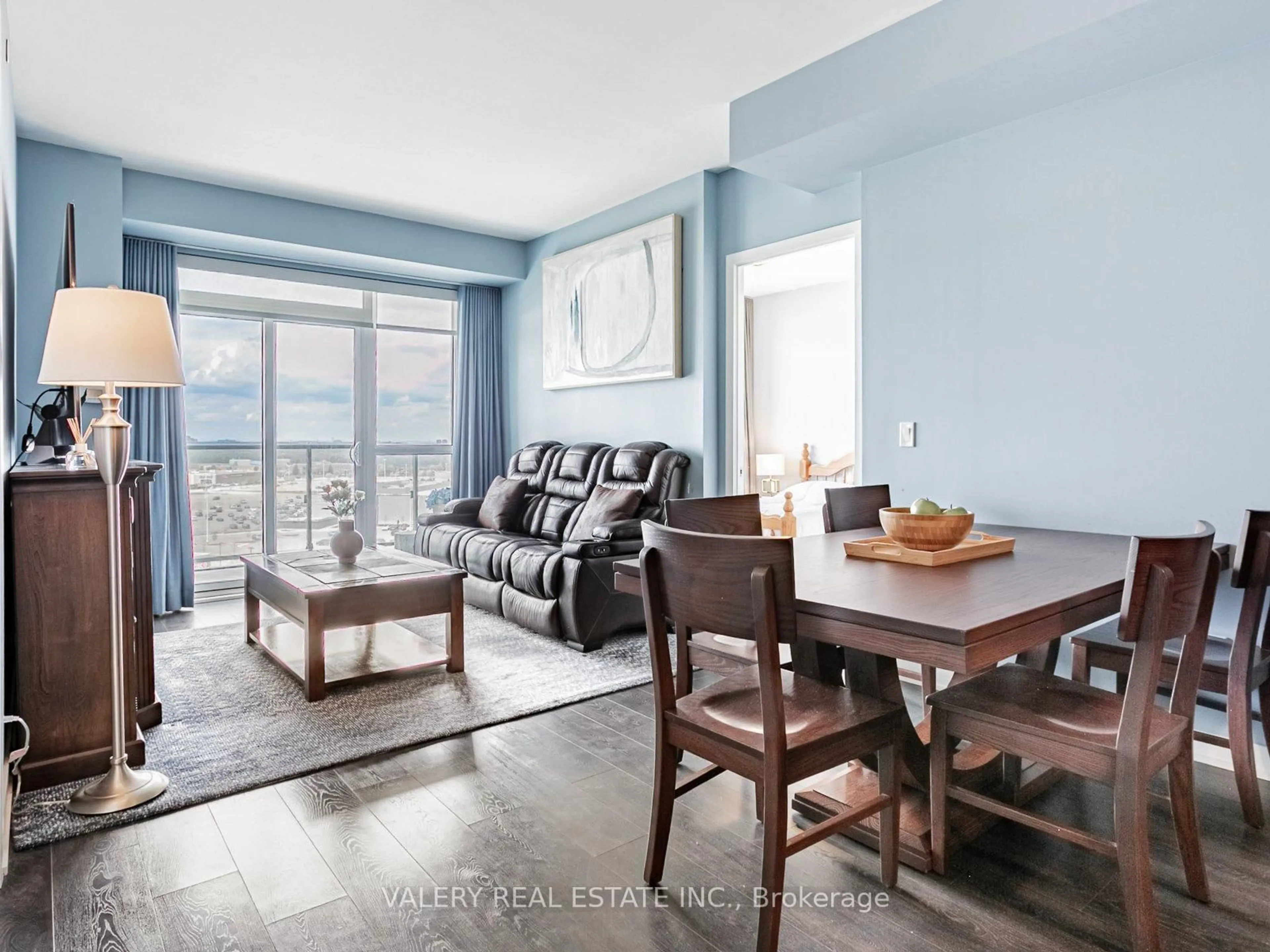 Living room with furniture, wood/laminate floor for 4655 Glen Erin Dr #1002, Mississauga Ontario L5M 0Z1