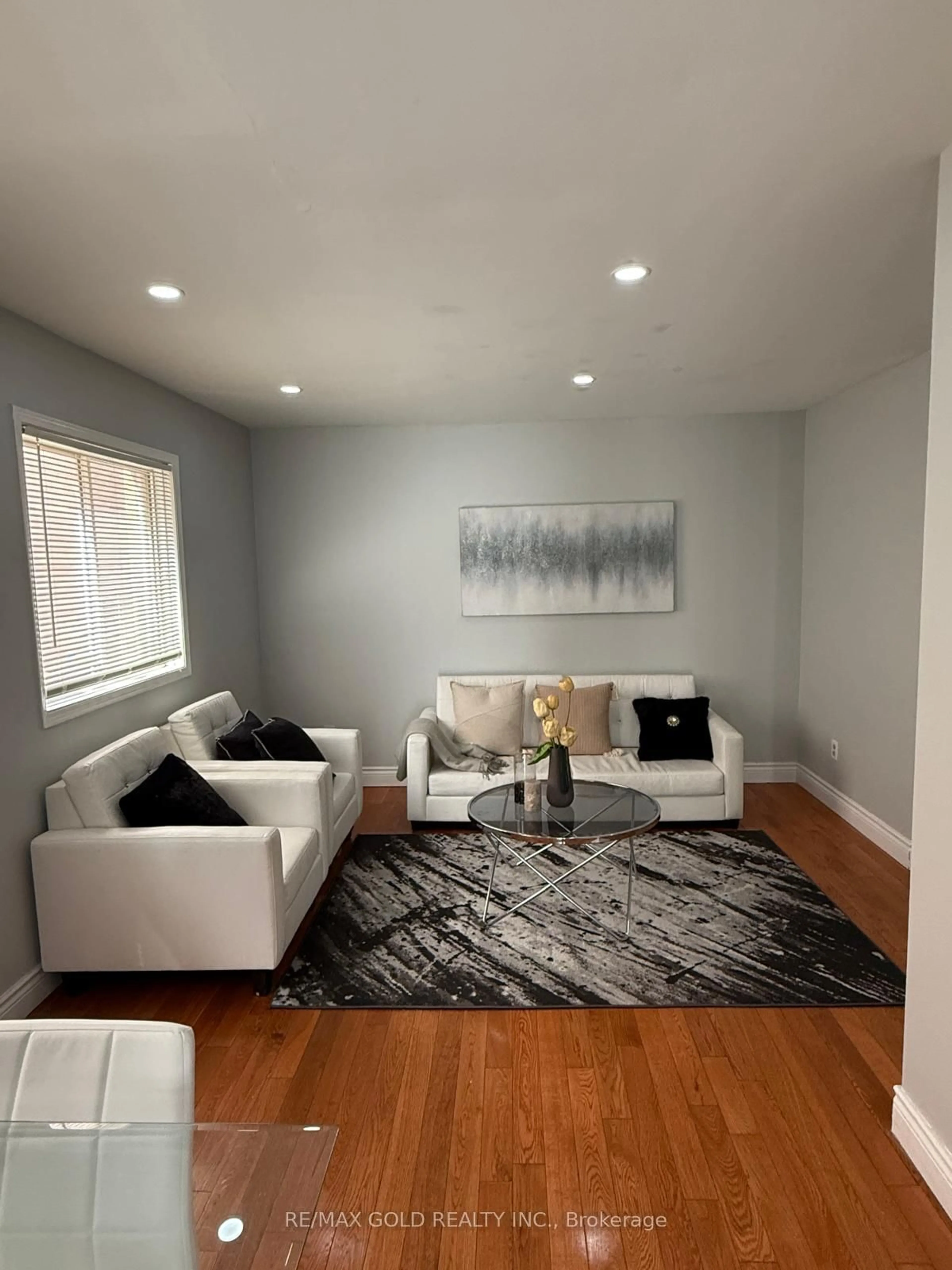 Living room with furniture, unknown for 65 Cedarwood Cres, Brampton Ontario L6X 4J9