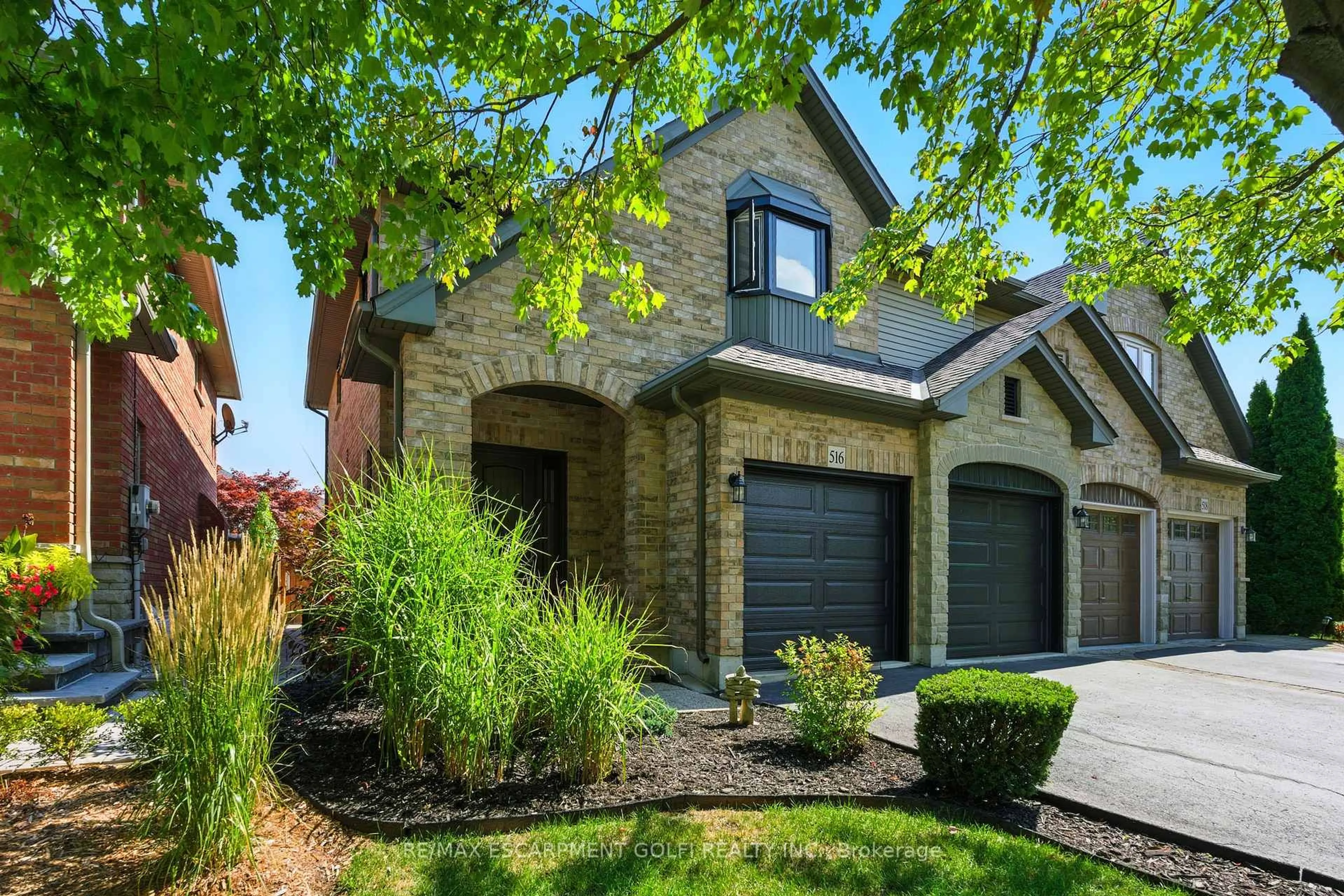 Home with brick exterior material, street for 516 Sandcherry Dr, Burlington Ontario L7T 4L5