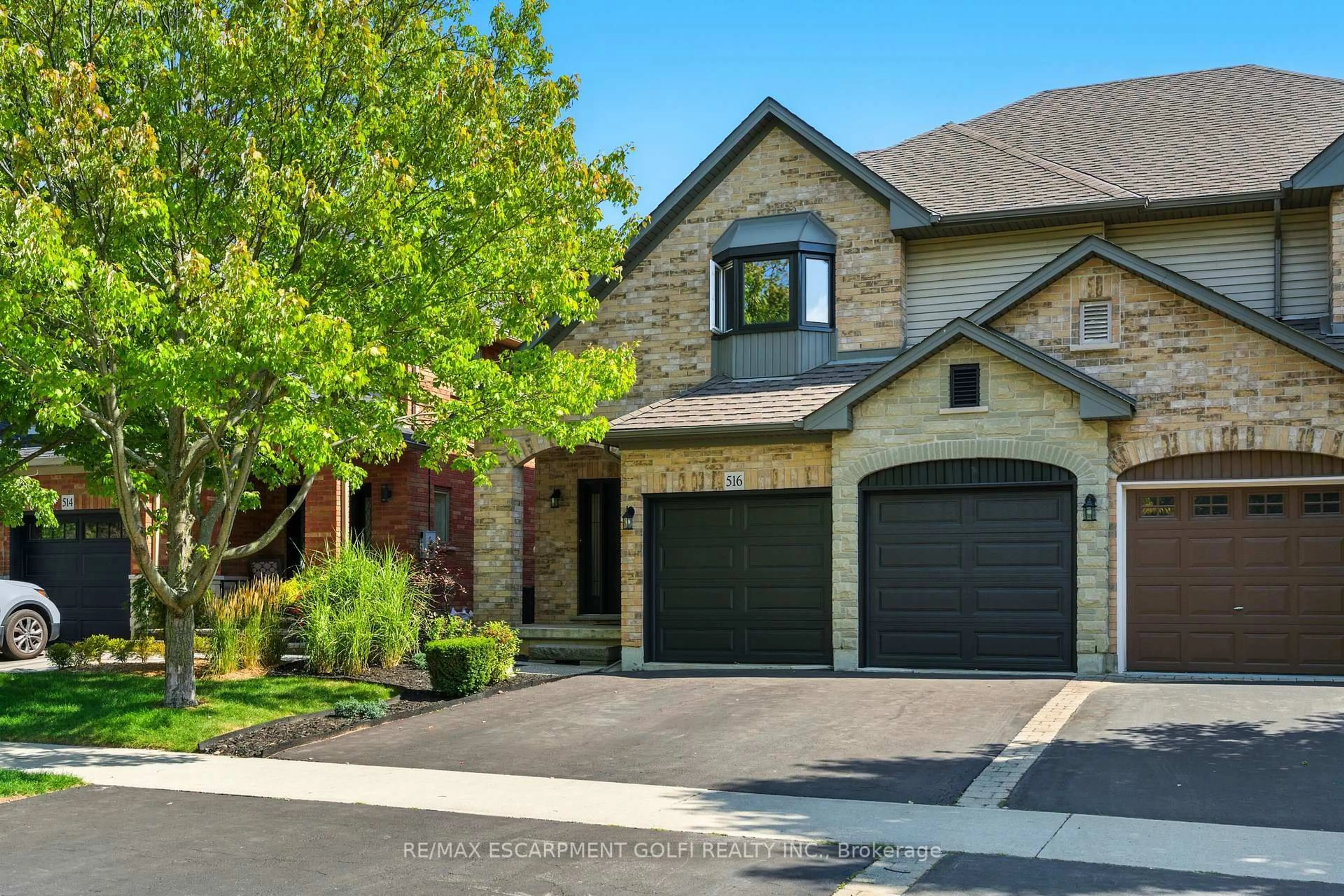 Home with brick exterior material, street for 516 Sandcherry Dr, Burlington Ontario L7T 4L5
