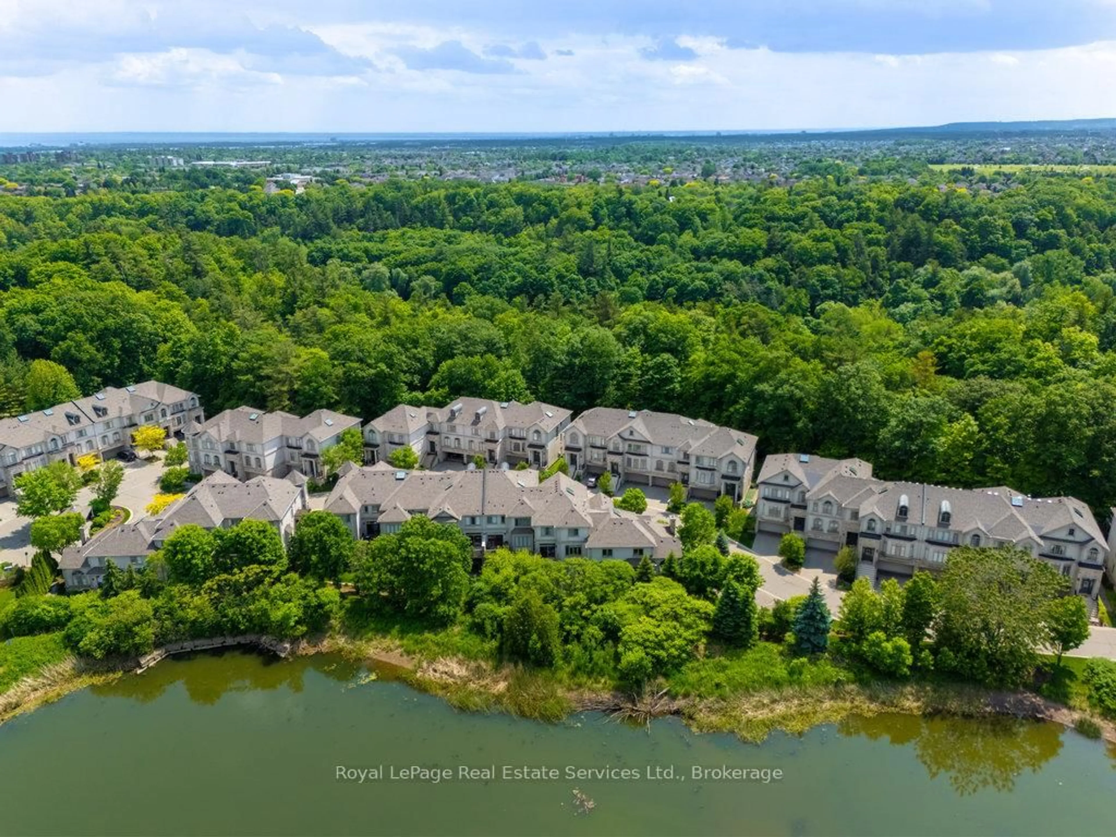 A pic from outside/outdoor area/front of a property/back of a property/a pic from drone, water/lake/river/ocean view for 2400 Neyagawa Blvd #34, Oakville Ontario L6H 7P5