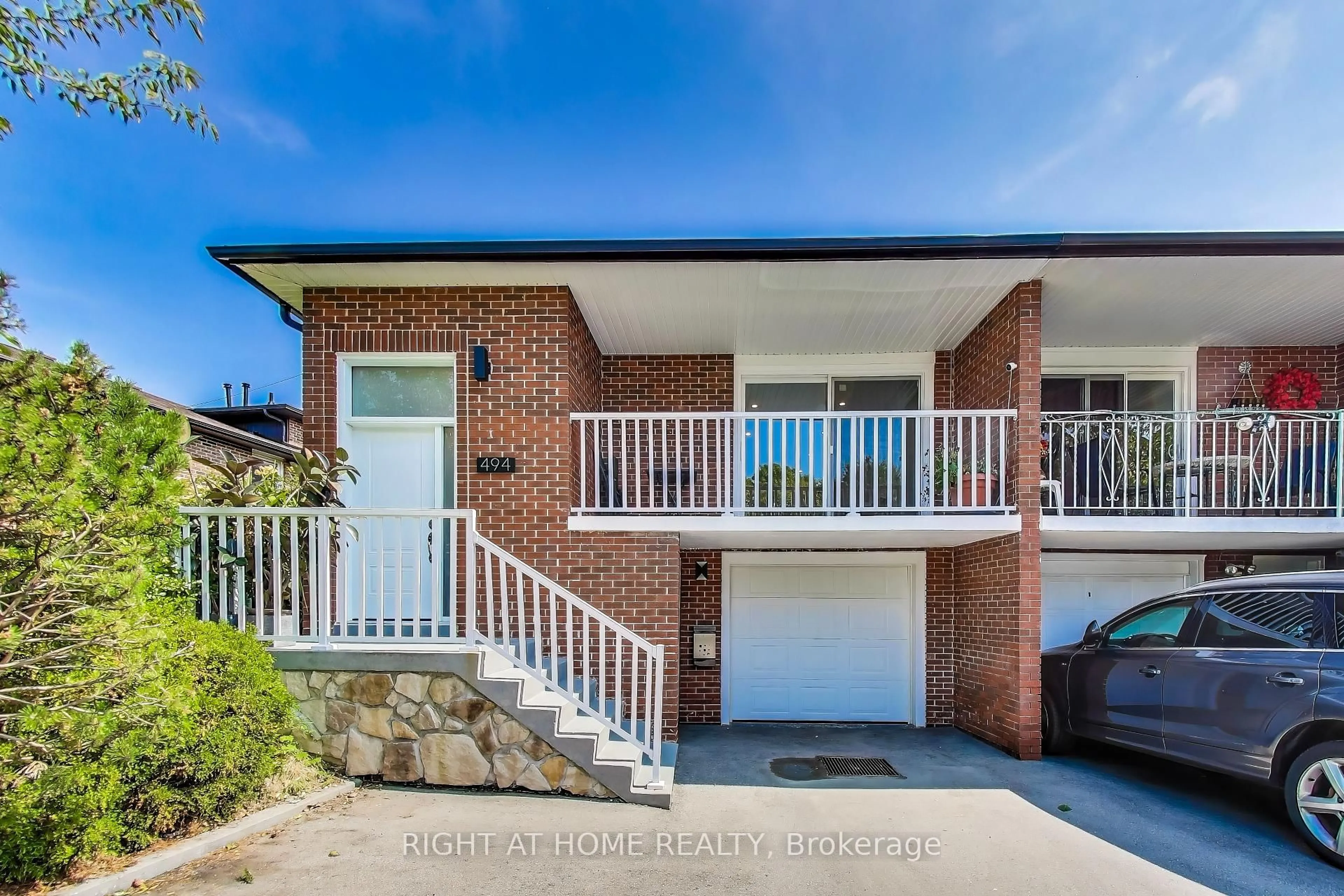 Home with brick exterior material, street for 494 Meadows Blvd, Mississauga Ontario L4Z 1G6