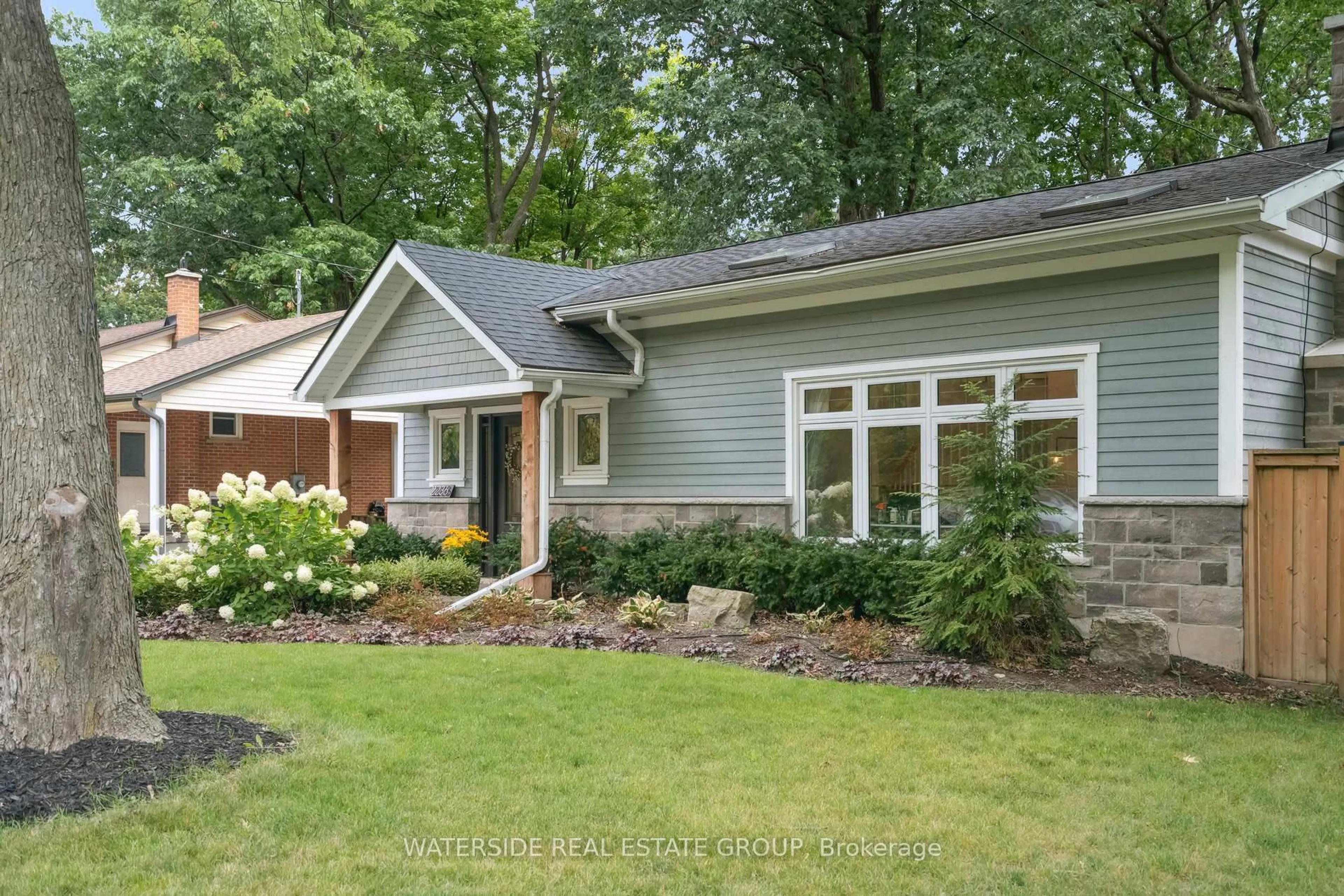 Home with vinyl exterior material, street for 2236 Mount Forest Dr, Burlington Ontario L7P 1J1