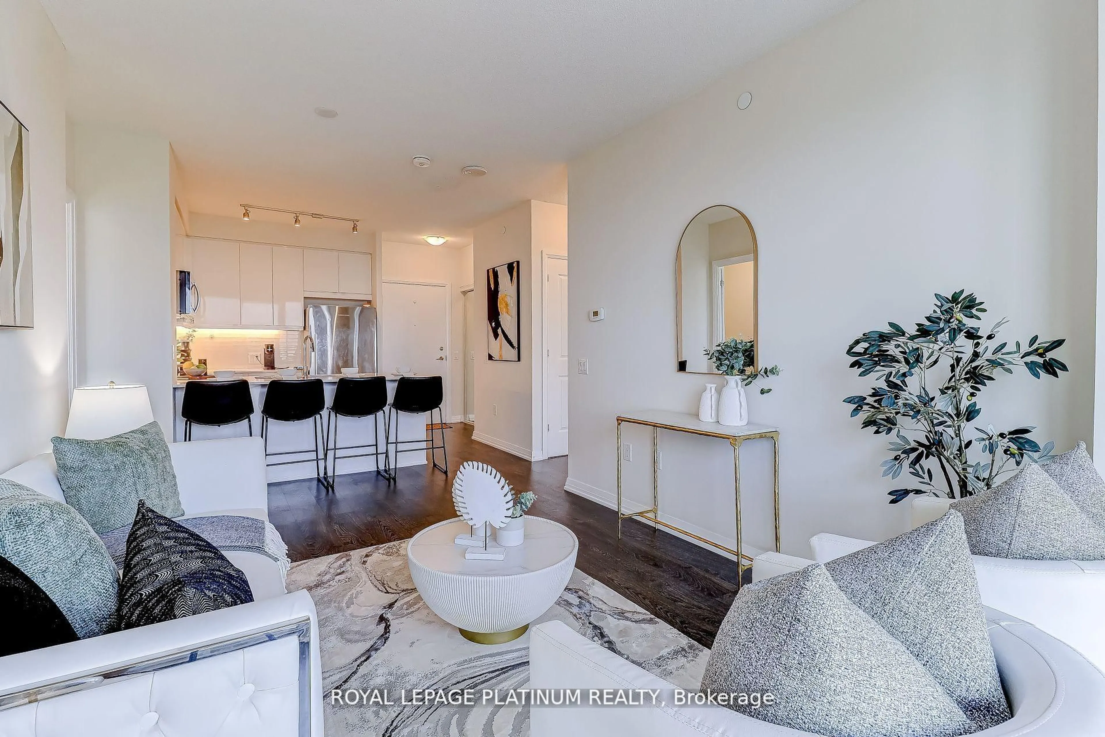 Living room with furniture, unknown for 50 Thomas Riley Rd #703, Toronto Ontario M9B 0C5