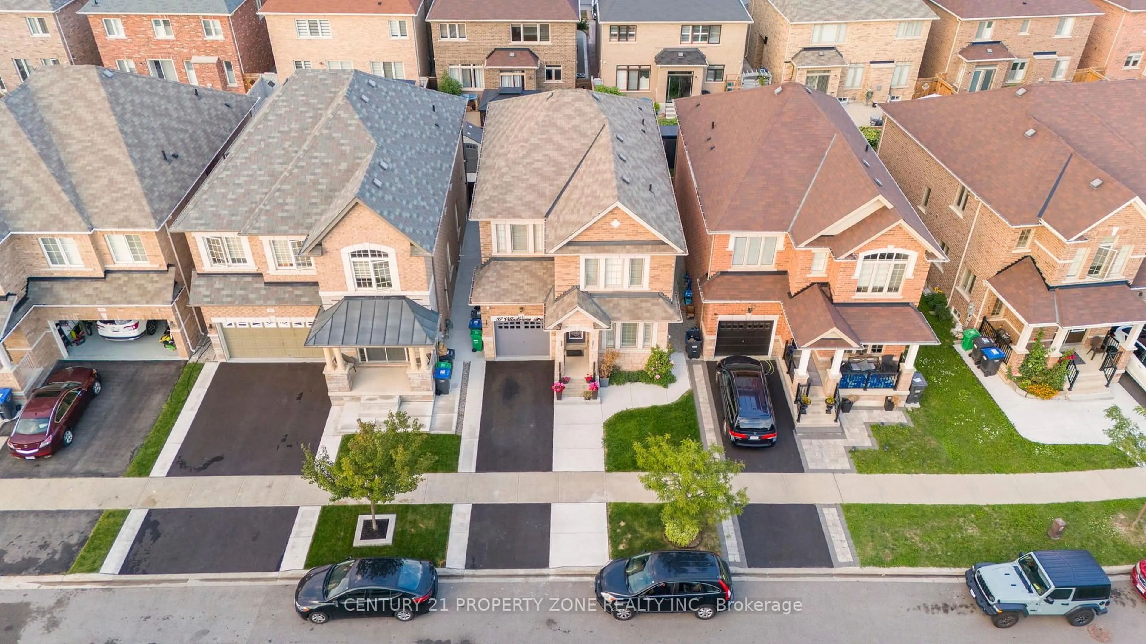 A pic from outside/outdoor area/front of a property/back of a property/a pic from drone, street for 87 Villadowns Tr, Brampton Ontario L6R 3Y8