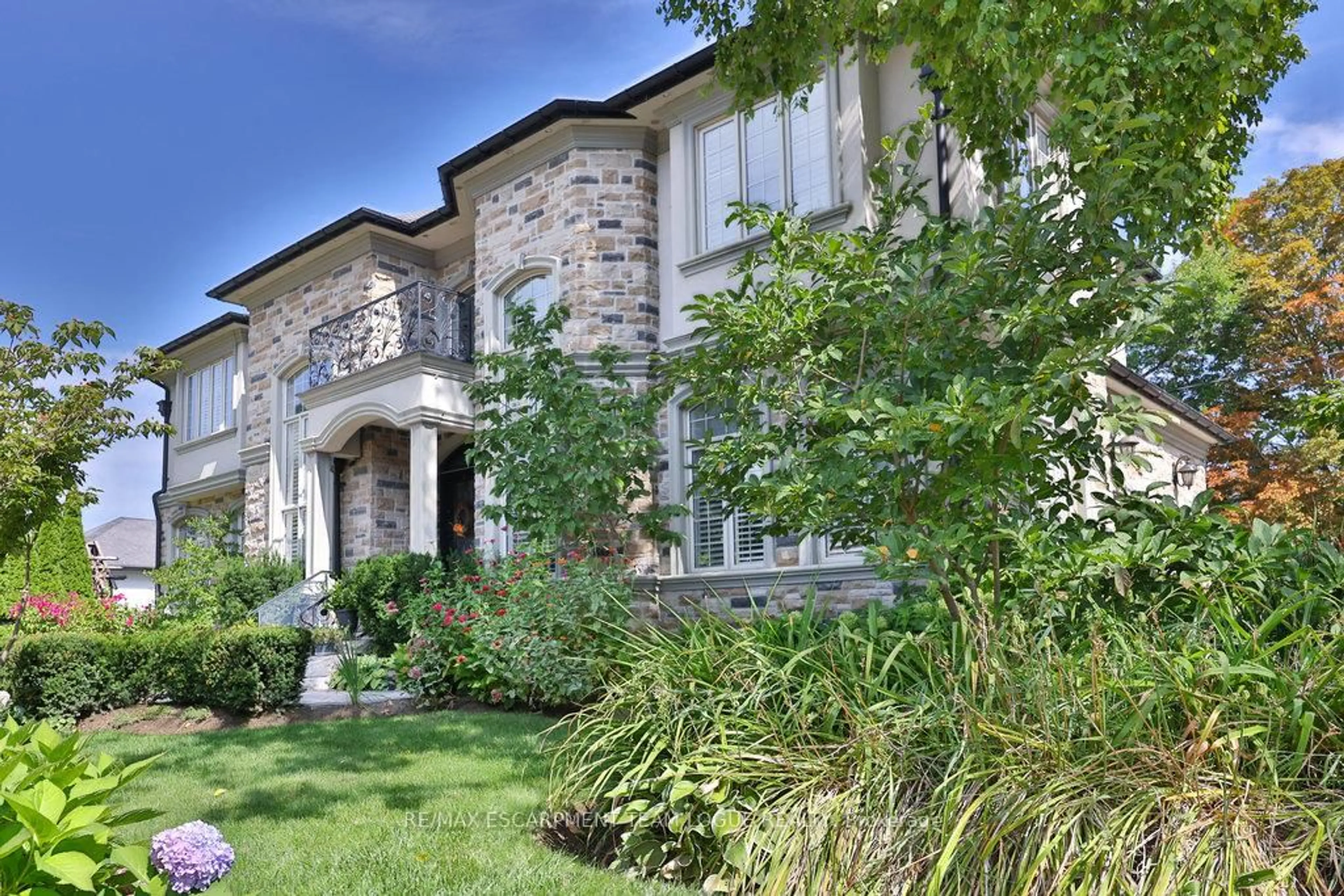 Home with brick exterior material, street for 2229 Lakeshore Rd, Burlington Ontario L7R 1B1