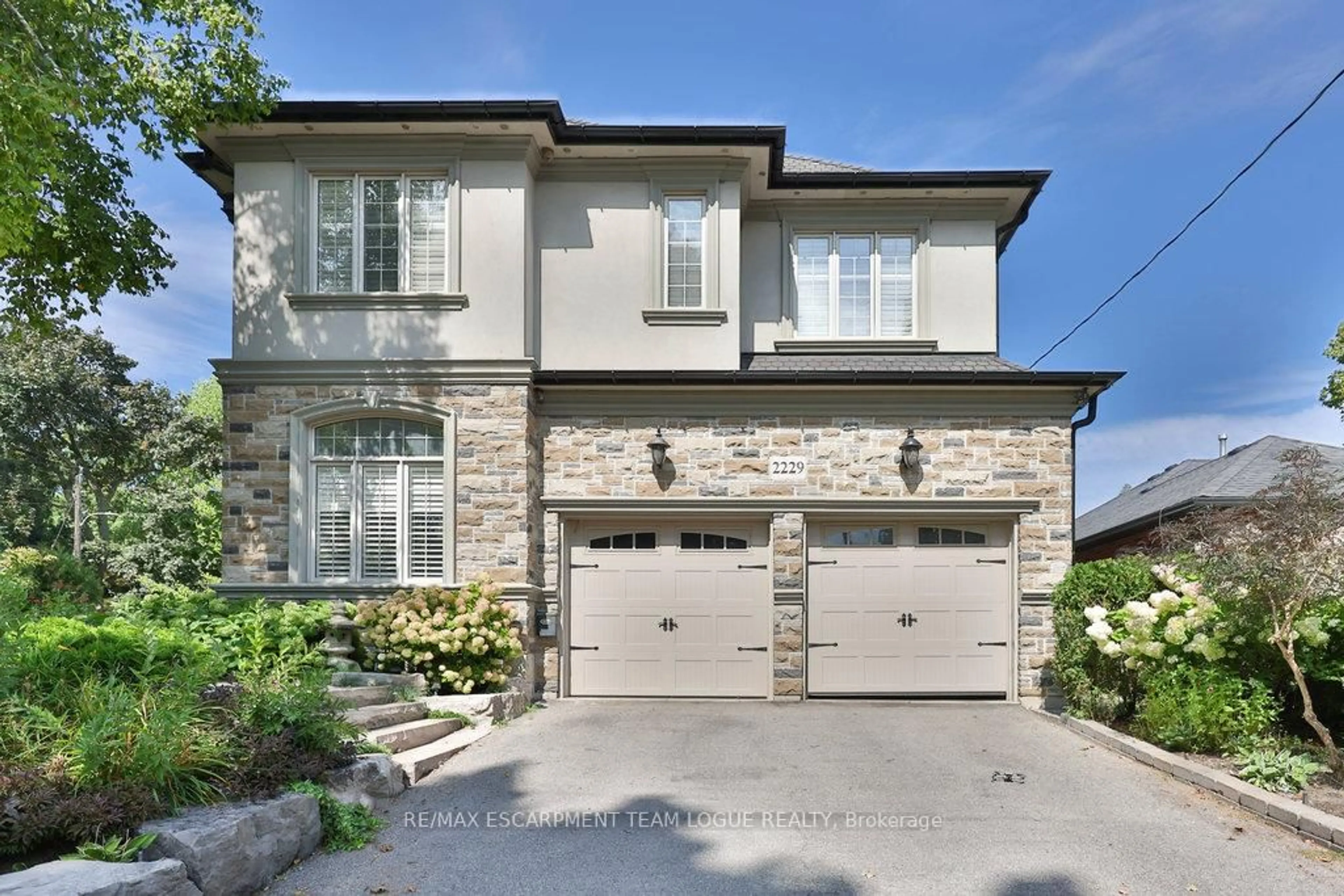 Home with brick exterior material, street for 2229 Lakeshore Rd, Burlington Ontario L7R 1B1