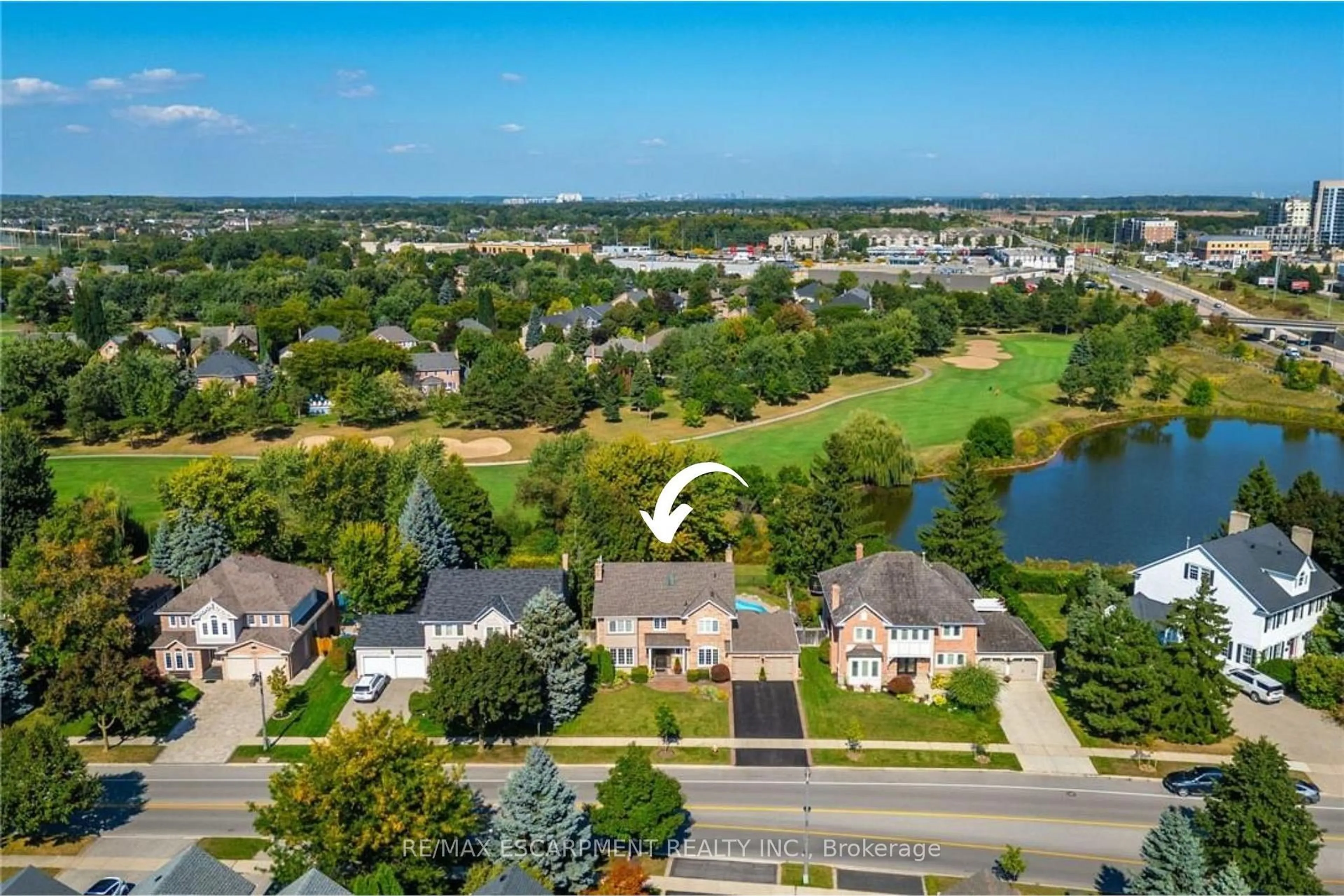 A pic from outside/outdoor area/front of a property/back of a property/a pic from drone, water/lake/river/ocean view for 2049 Country Club Dr, Burlington Ontario L7M 3Z2