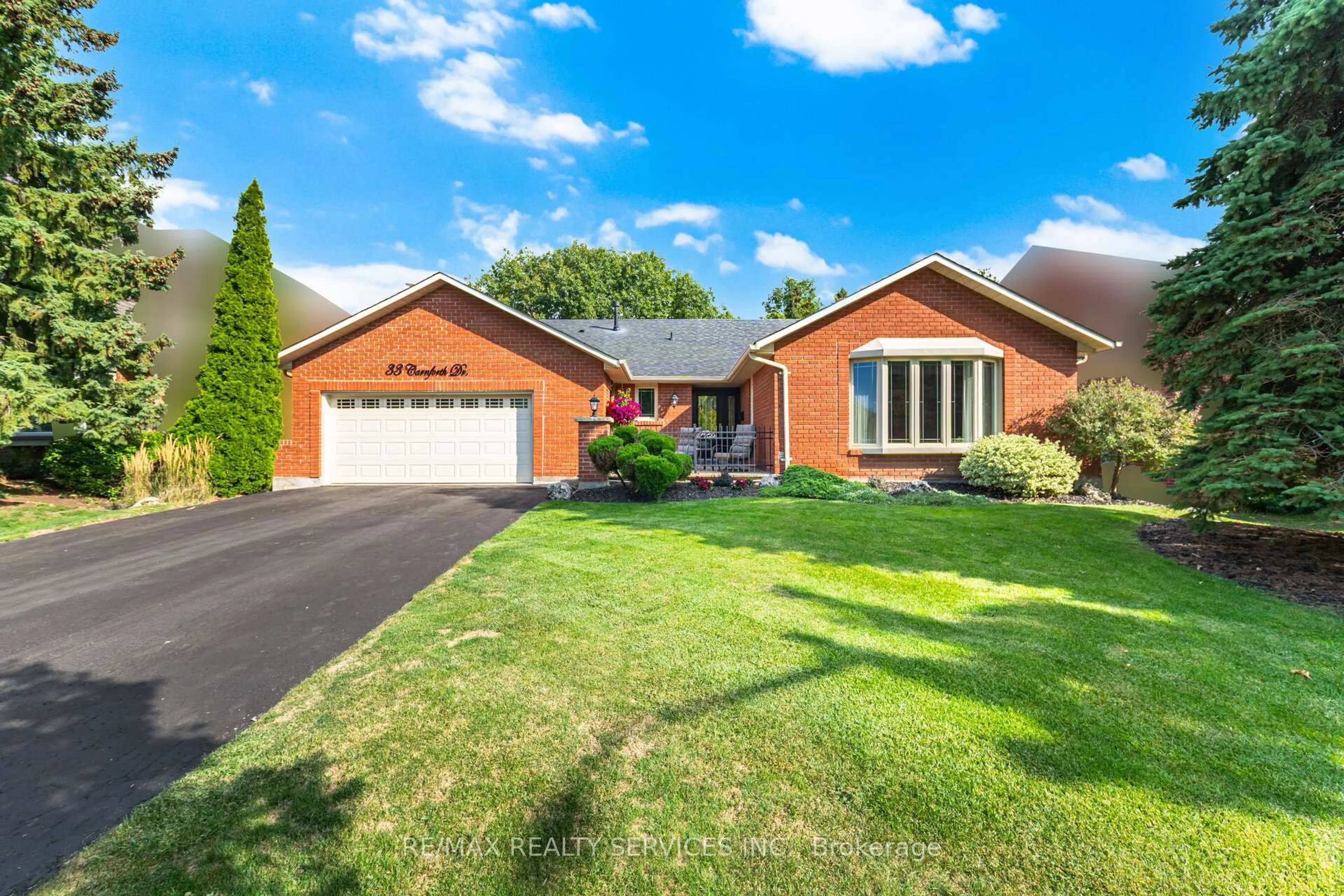 Home with brick exterior material, street for 33 Carnforth Dr, Brampton Ontario L6Z 1T8