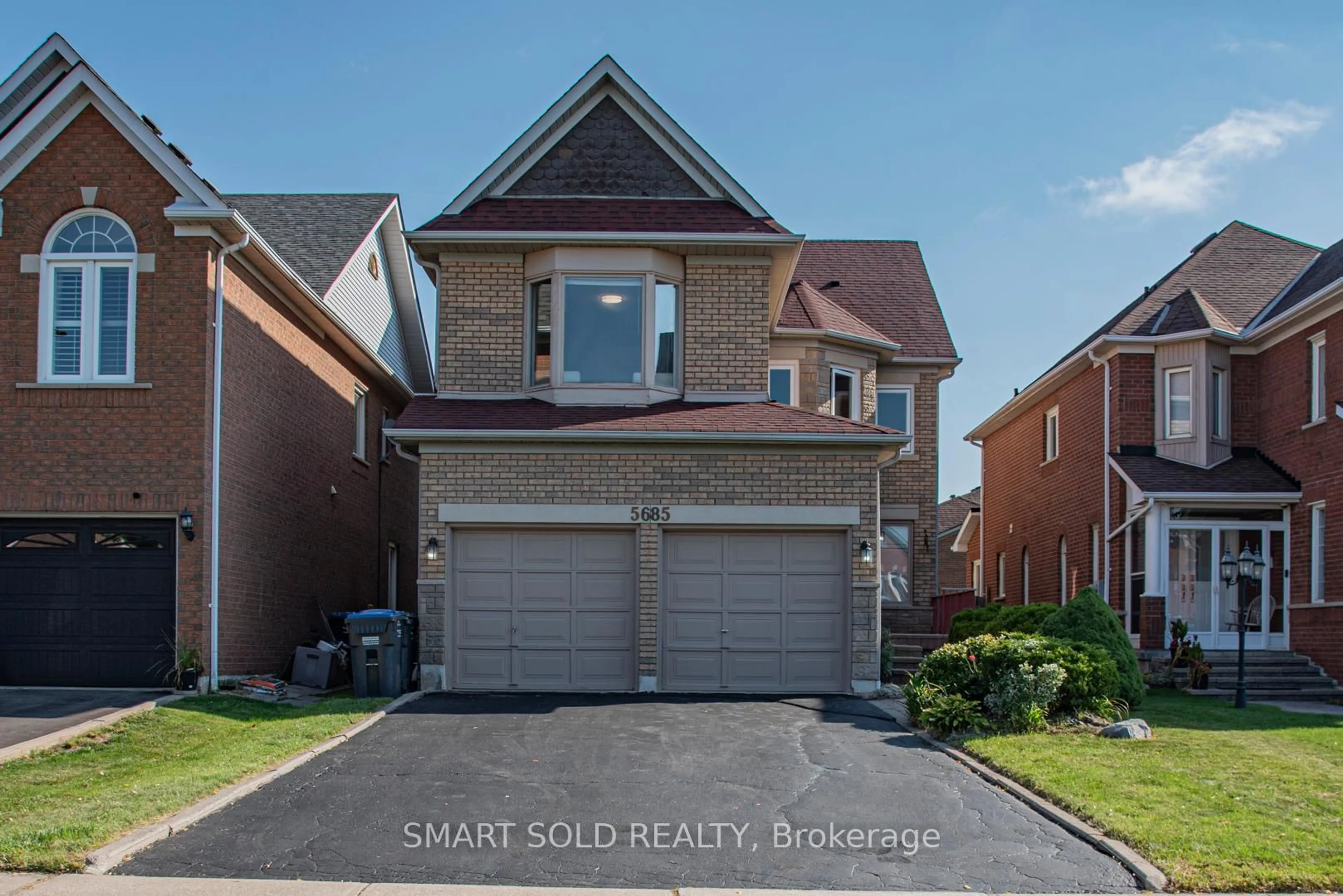 Home with brick exterior material, street for 5685 Bell Harbour Dr, Mississauga Ontario L5M 5K2