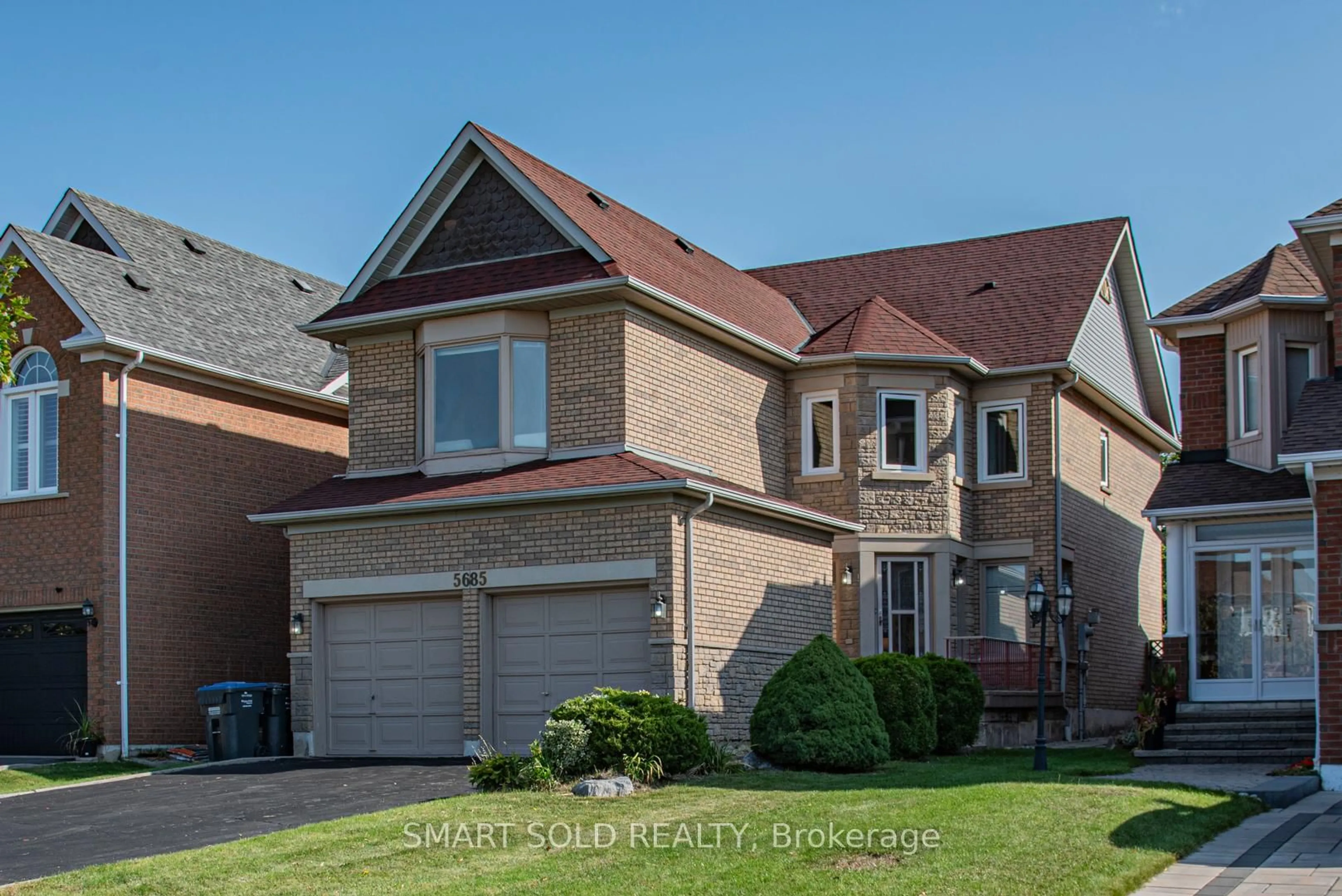 Home with brick exterior material, street for 5685 Bell Harbour Dr, Mississauga Ontario L5M 5K2