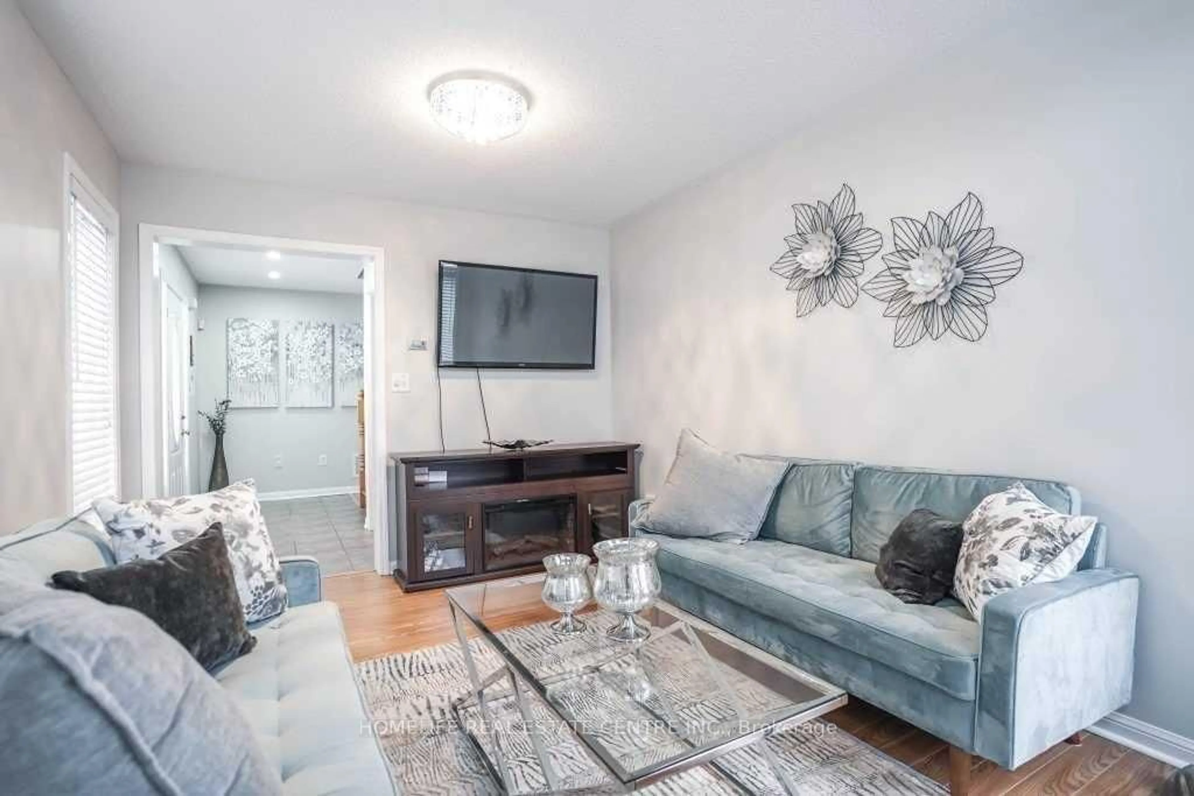 Living room with furniture, unknown for 2 Chudleigh Ave, Brampton Ontario L6X 0N1