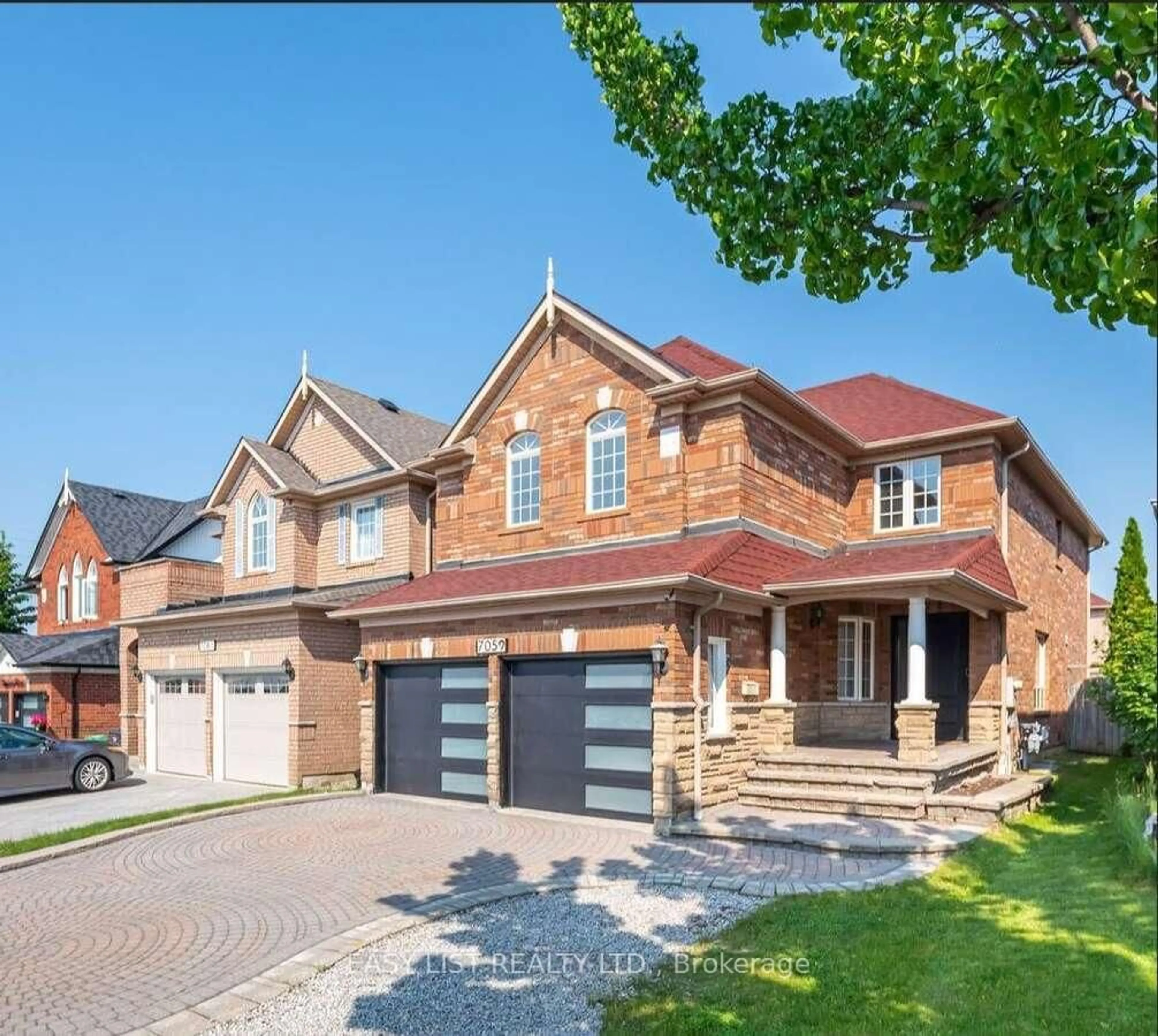 Home with brick exterior material, street for 7059 Magistrate Terr, Mississauga Ontario L5W 1E4