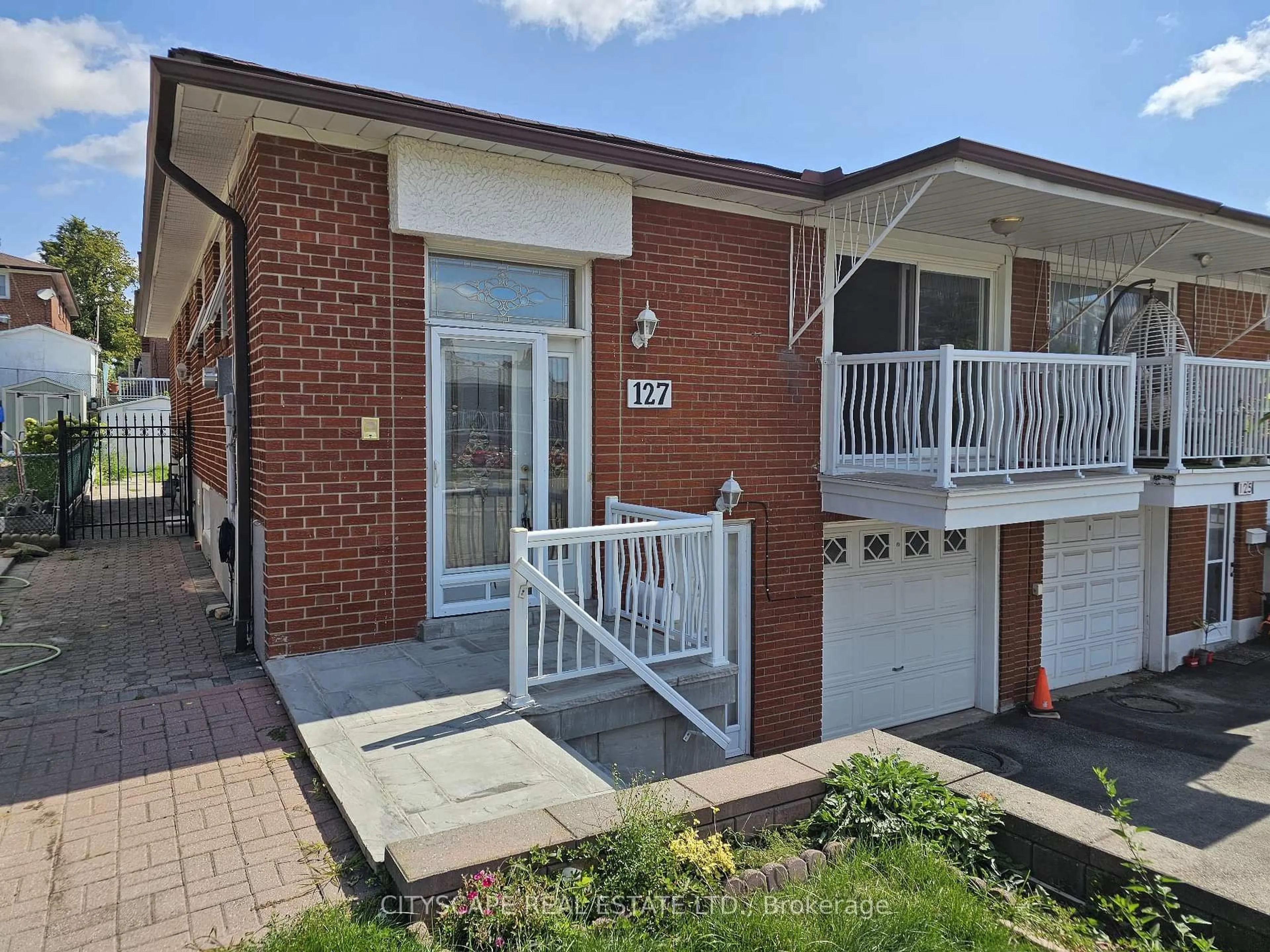 Home with brick exterior material, street for 127 Milady Rd, Toronto Ontario M9L 2J1