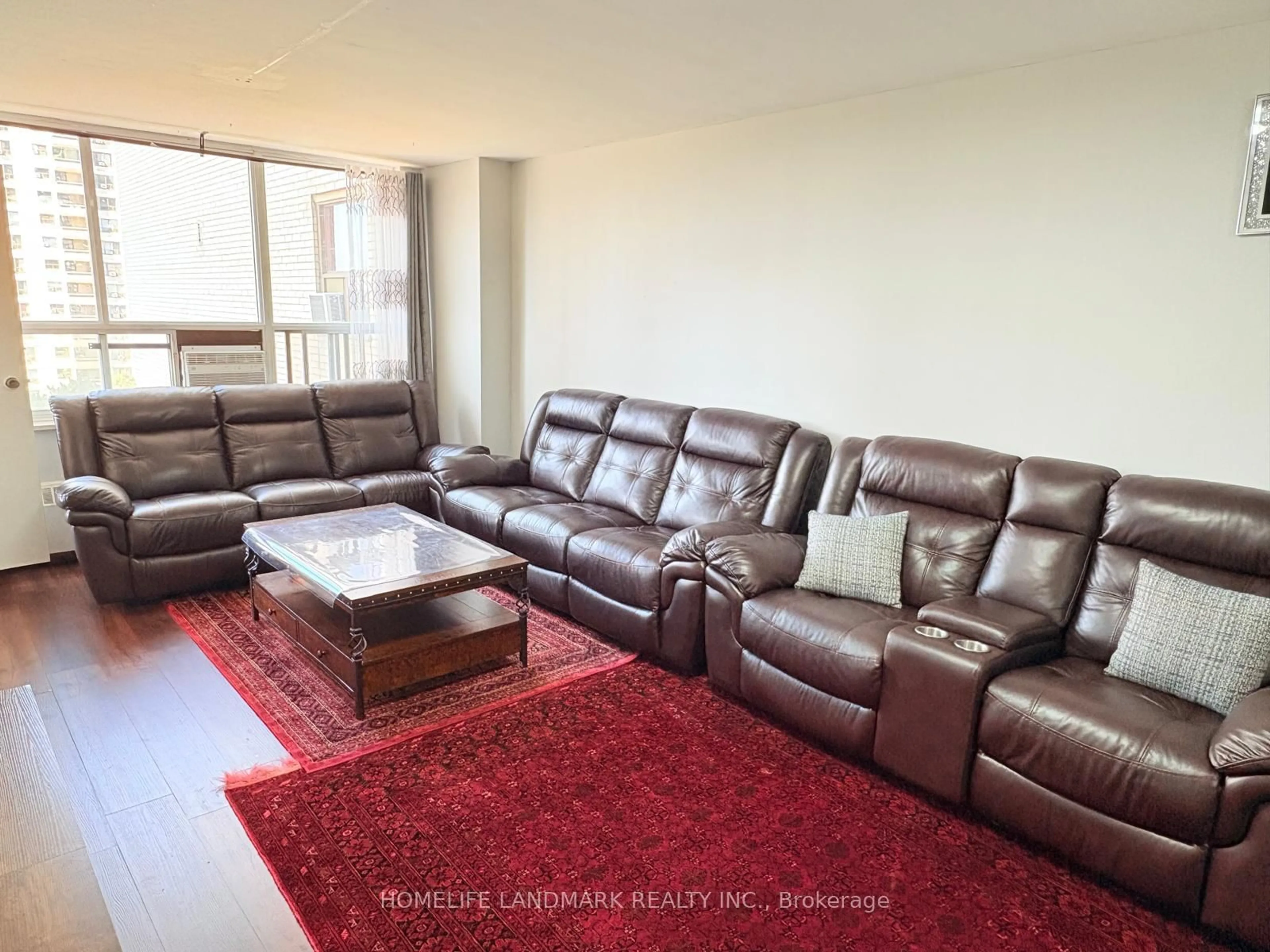Living room with furniture, unknown for 370 Dixon Rd #716, Toronto Ontario M9R 1T2