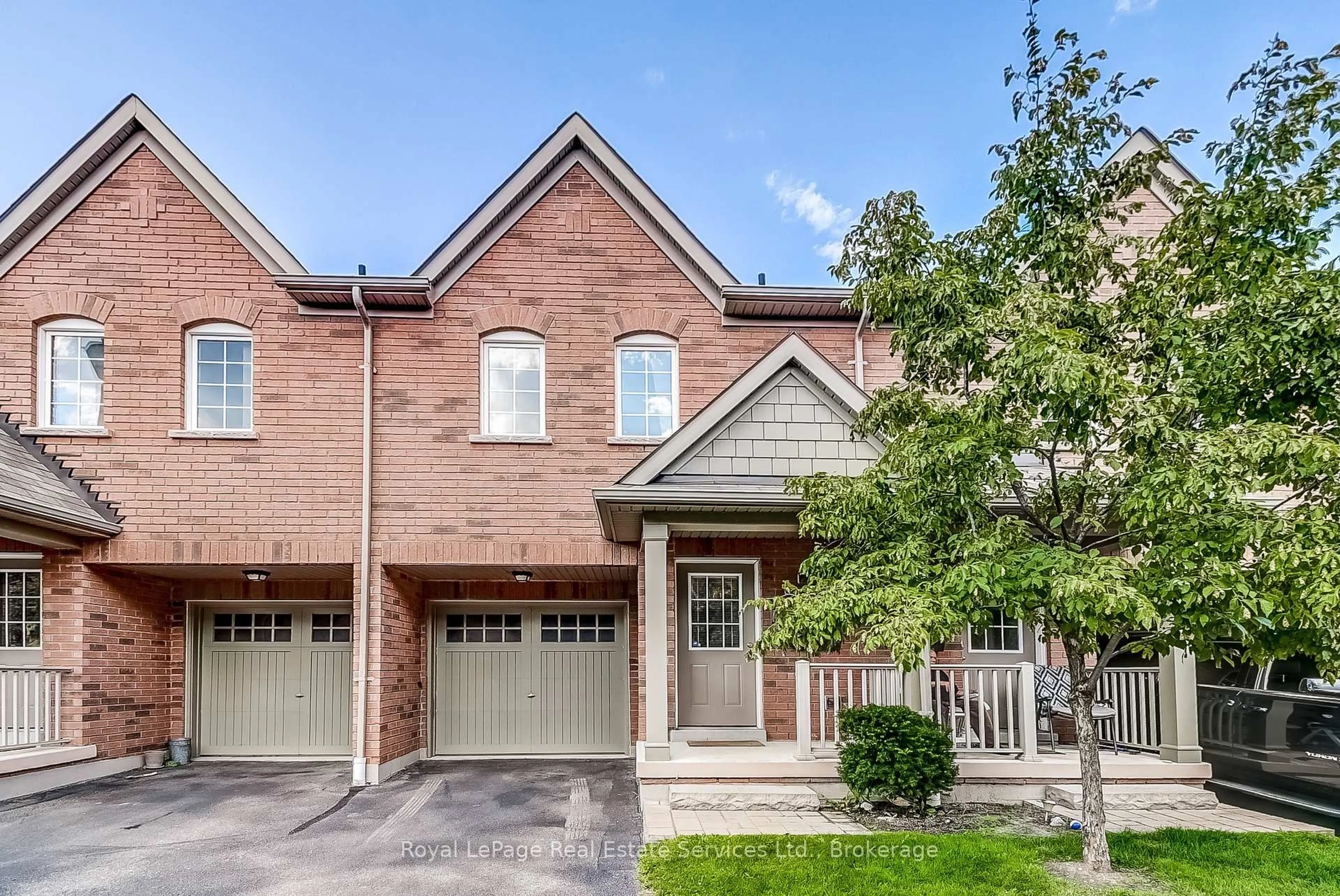 Home with brick exterior material, street for 233 Duskywing Way #22, Oakville Ontario L6L 0C5