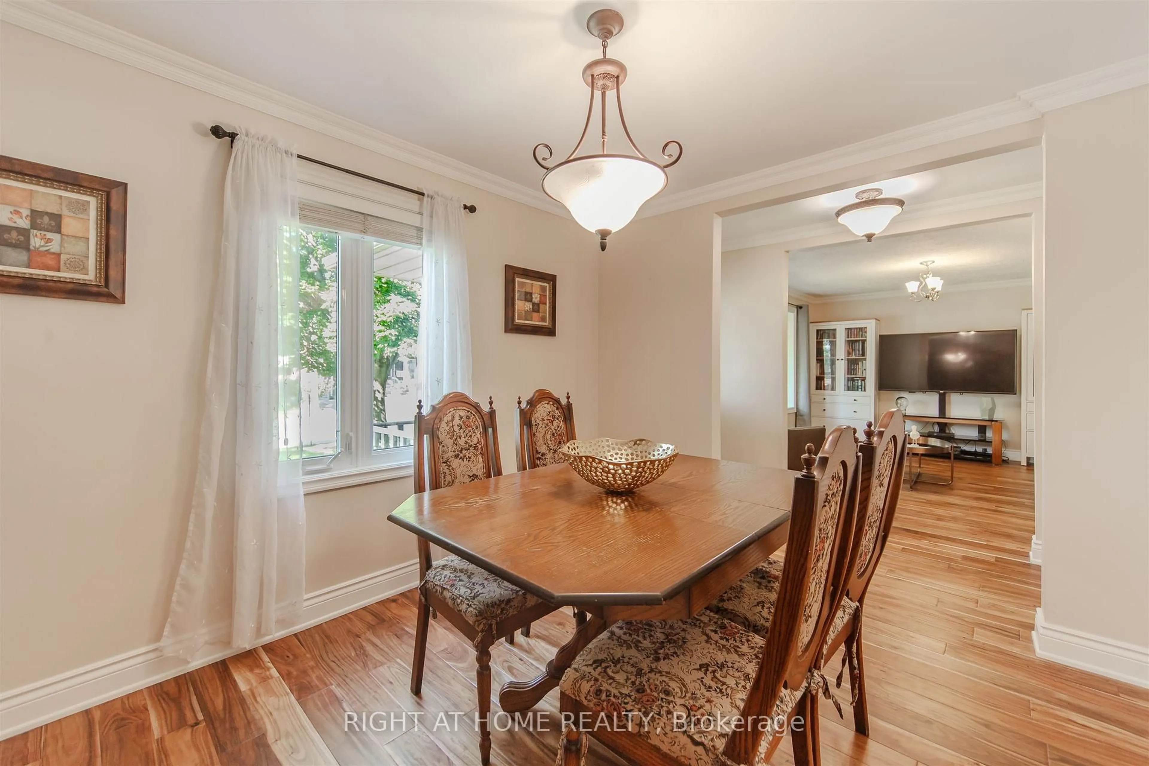 Dining room, wood/laminate floor for 7 Adele Ave, Toronto Ontario M3L 1J2