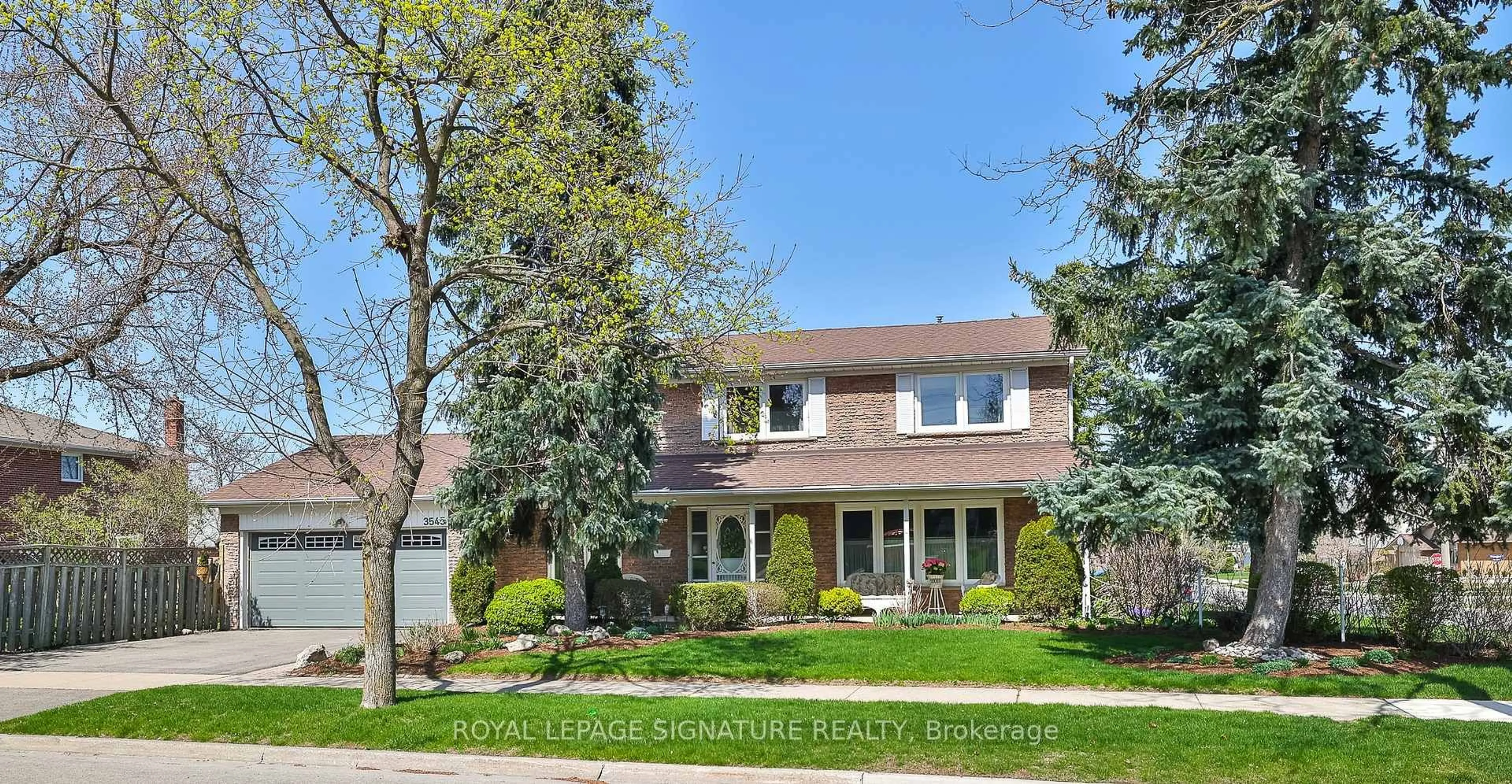 Home with brick exterior material, street for 3545 Twinmaple Dr, Mississauga Ontario L4Y 3P9