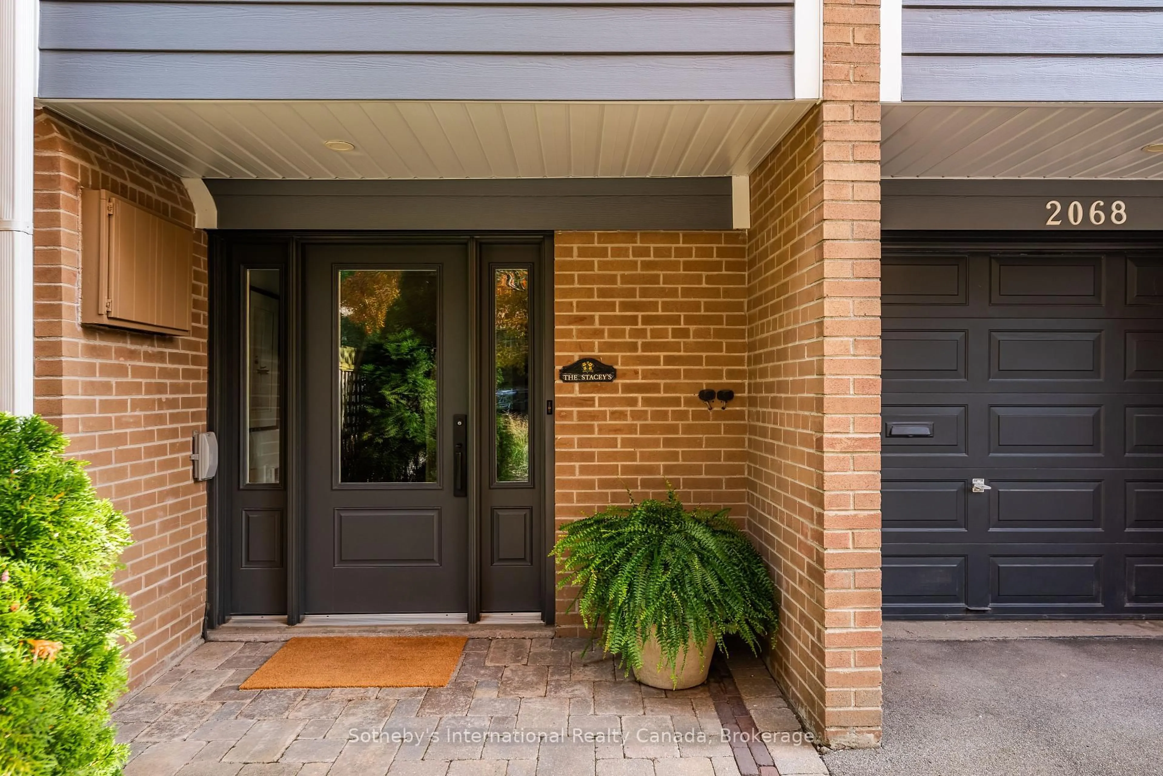 Home with brick exterior material, street for 2068 Water's Edge Dr, Oakville Ontario L6L 1A4