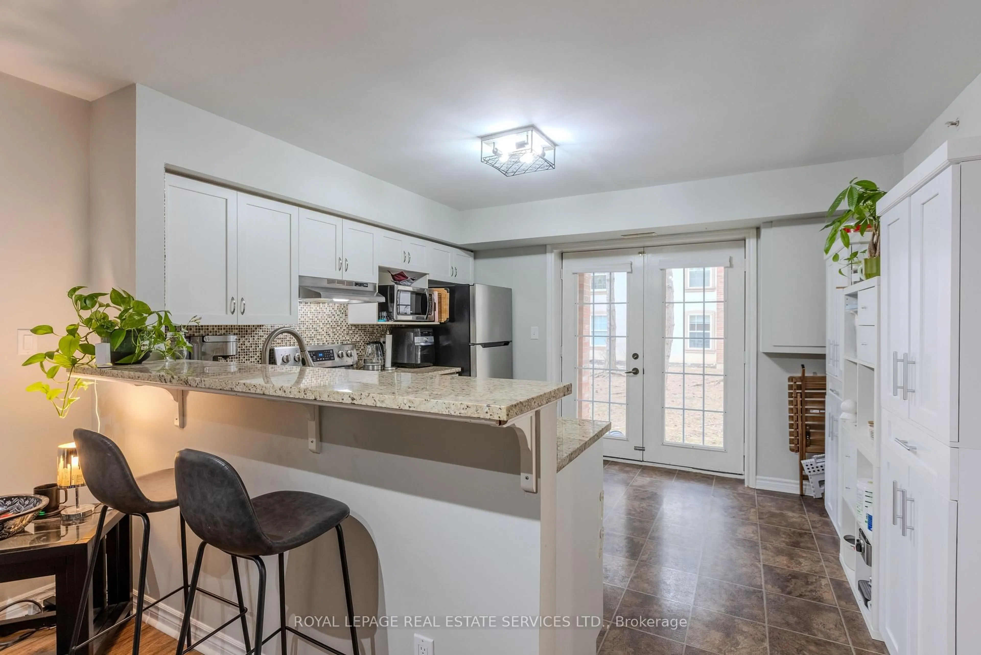 Open concept kitchen, ceramic/tile floor for 4013 Kilmer Dr #107, Burlington Ontario L7M 4M3