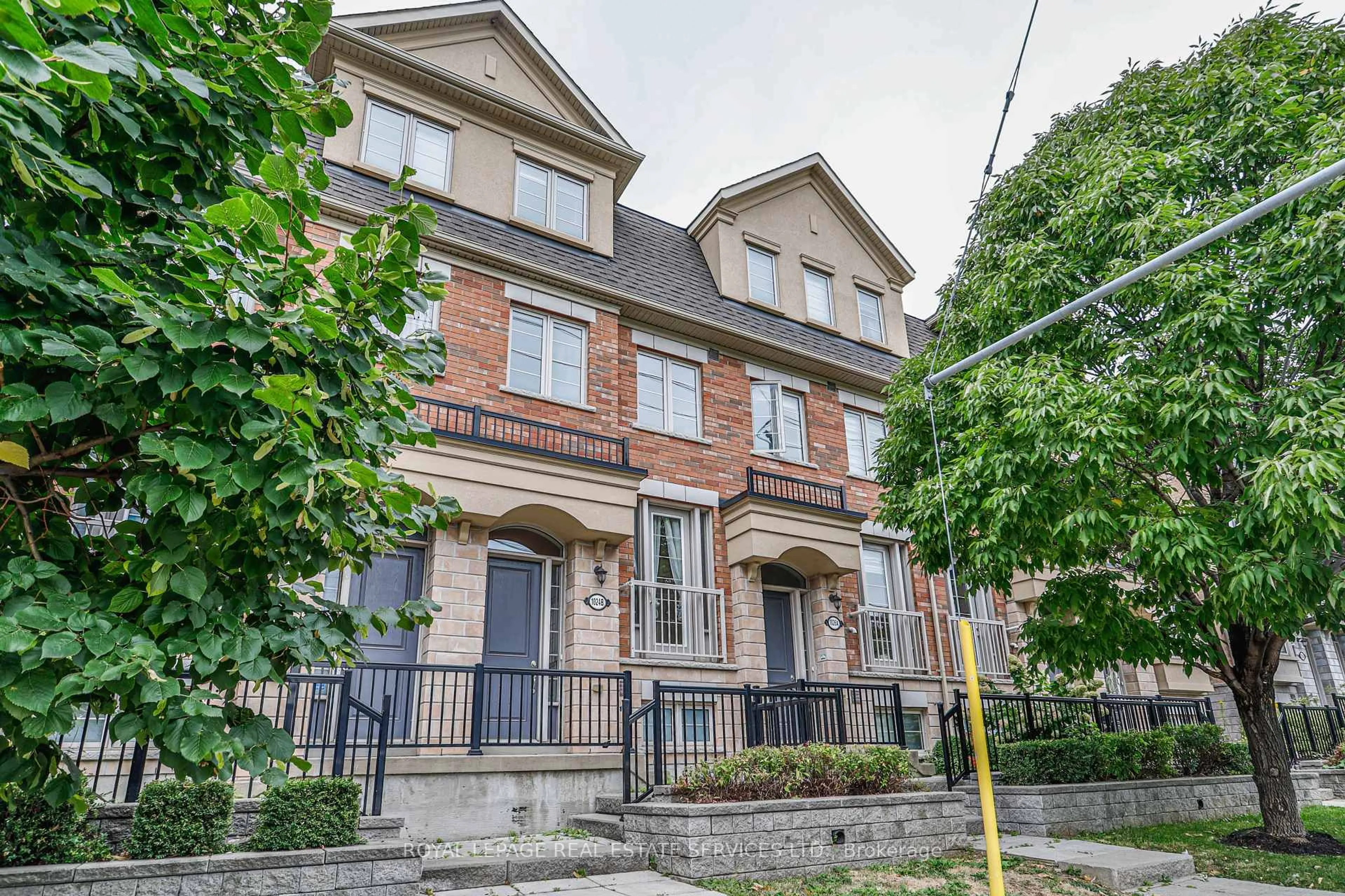 Home with brick exterior material, street for 1024B Islington Ave, Toronto Ontario M8Z 6A4