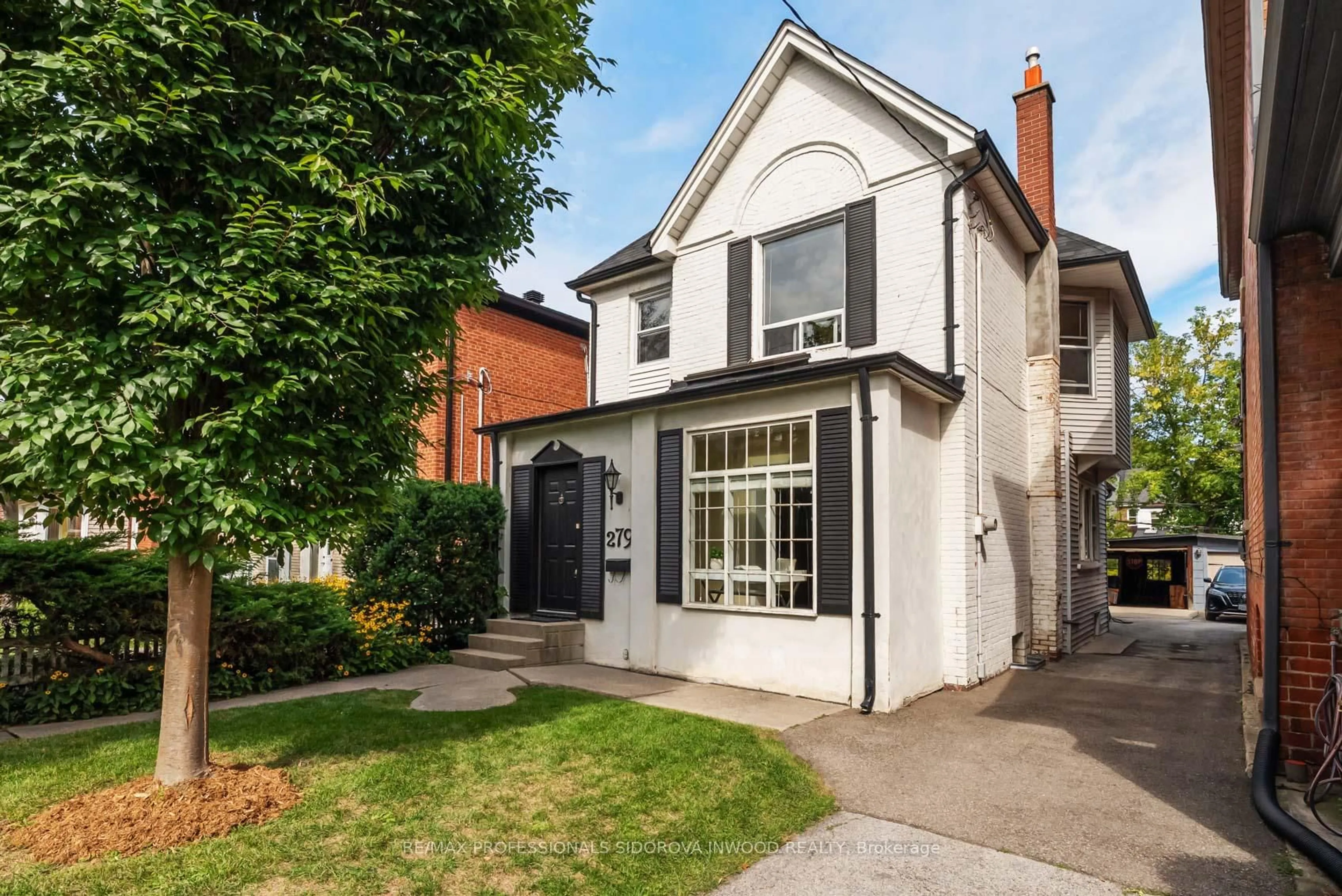 Home with brick exterior material, street for 279 Evelyn Ave, Toronto Ontario M6P 2Z8