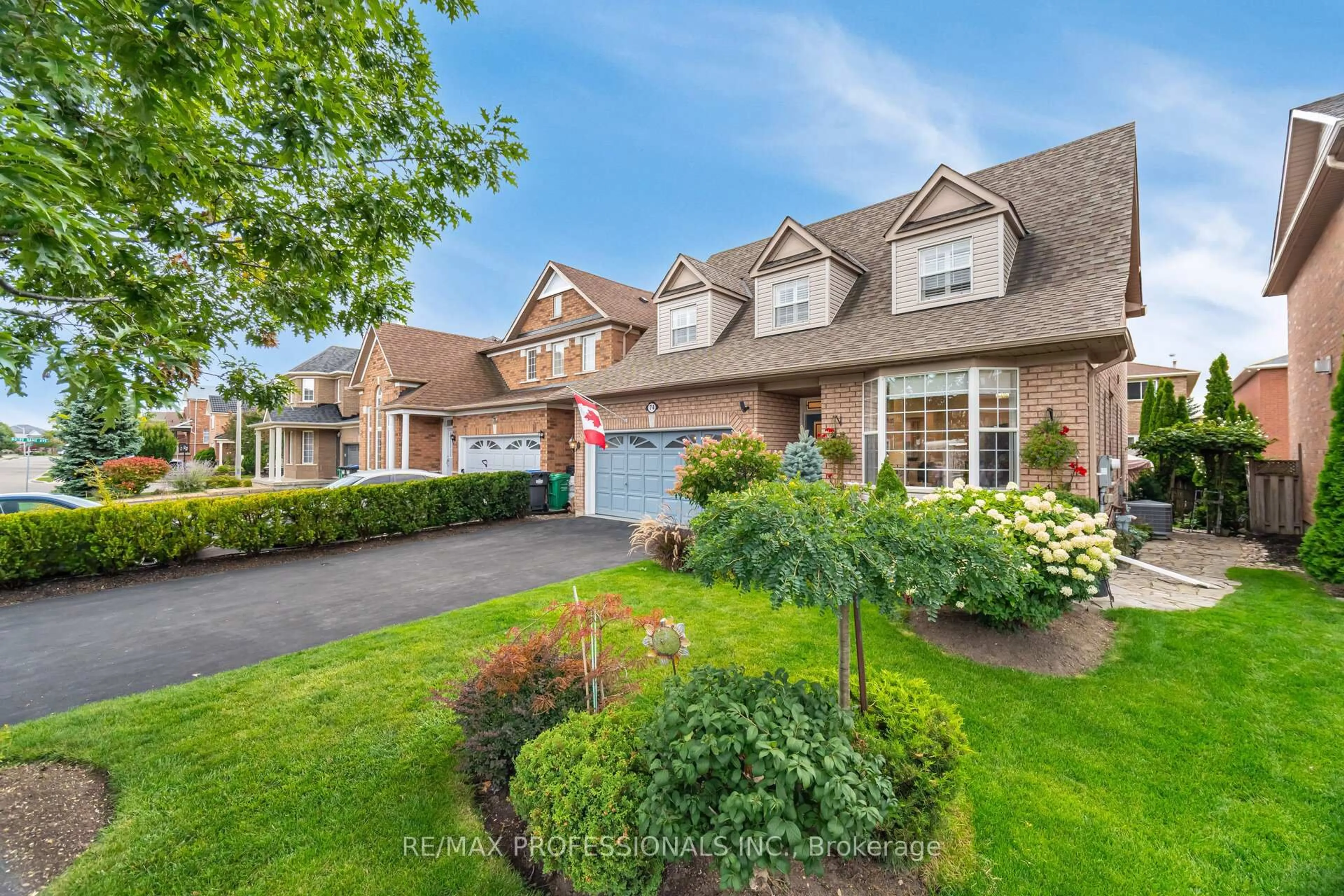 Home with brick exterior material, street for 74 Upper Higlands Dr, Brampton Ontario L6Z 4V9