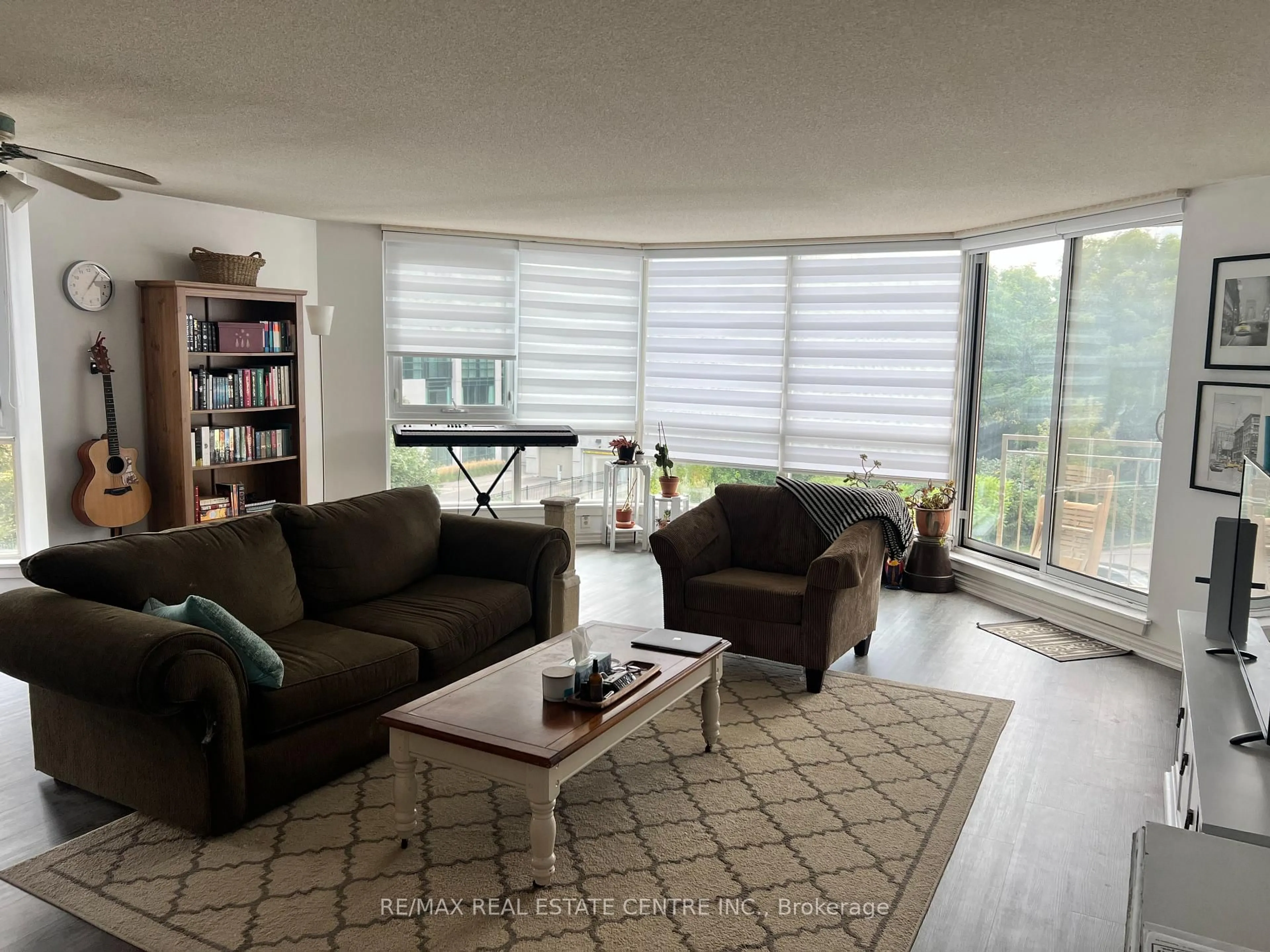 Living room with furniture, unknown for 26 Hall Rd #204, Halton Hills Ontario L7G 5G5