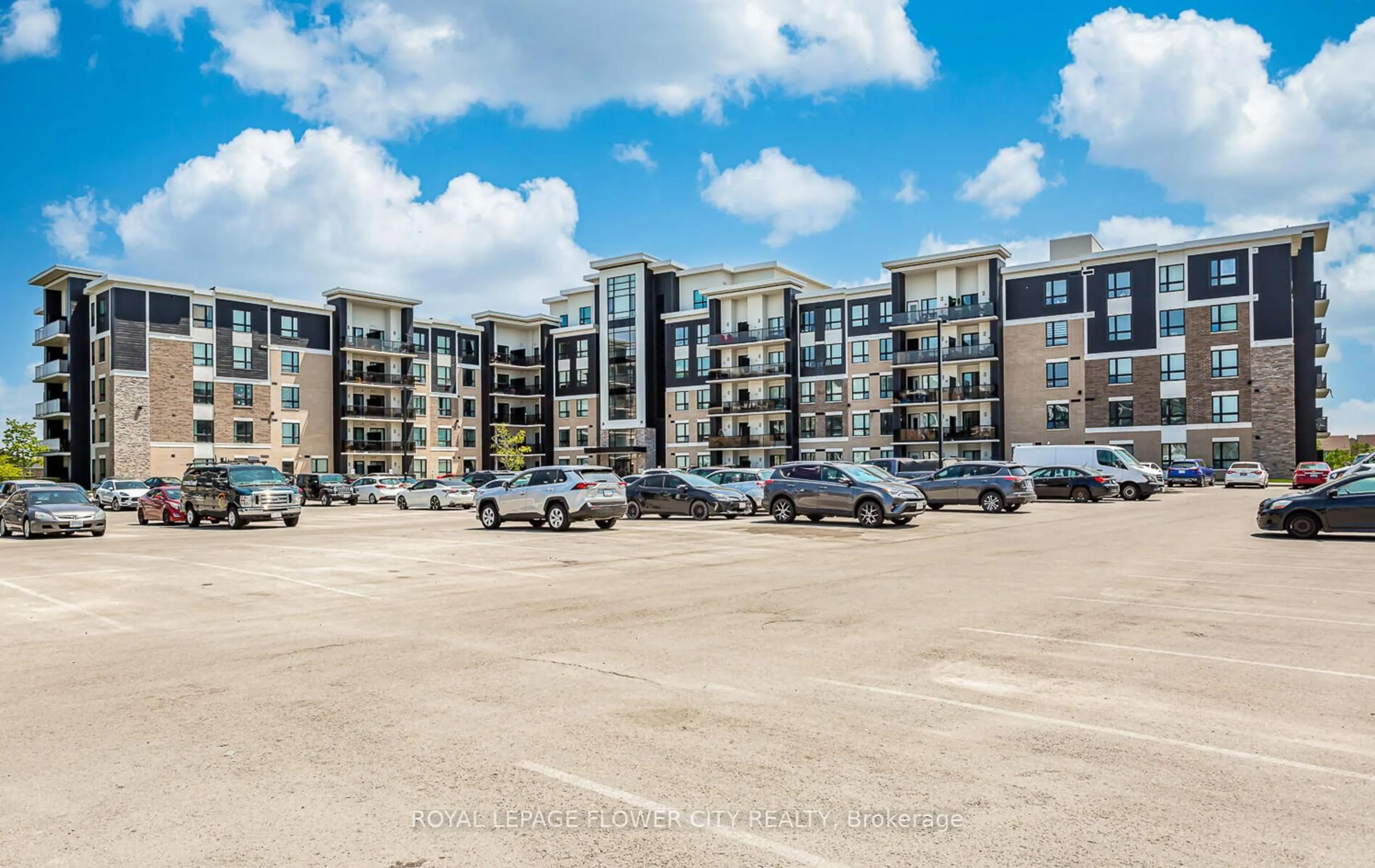 A pic from outside/outdoor area/front of a property/back of a property/a pic from drone, building for 640 Sauve St #313, Milton Ontario L9T 8M4