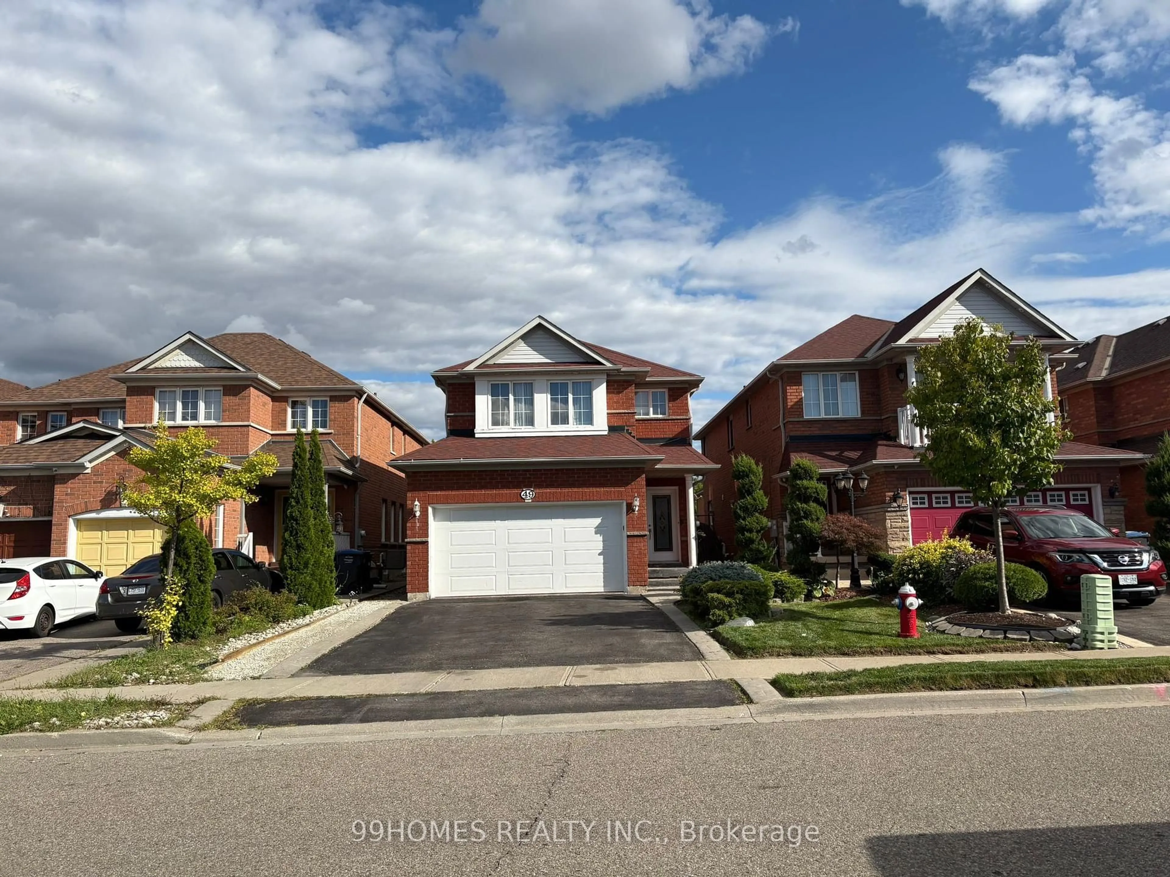 Home with brick exterior material, street for 49 Olympia Cres, Brampton Ontario L6X 4W2