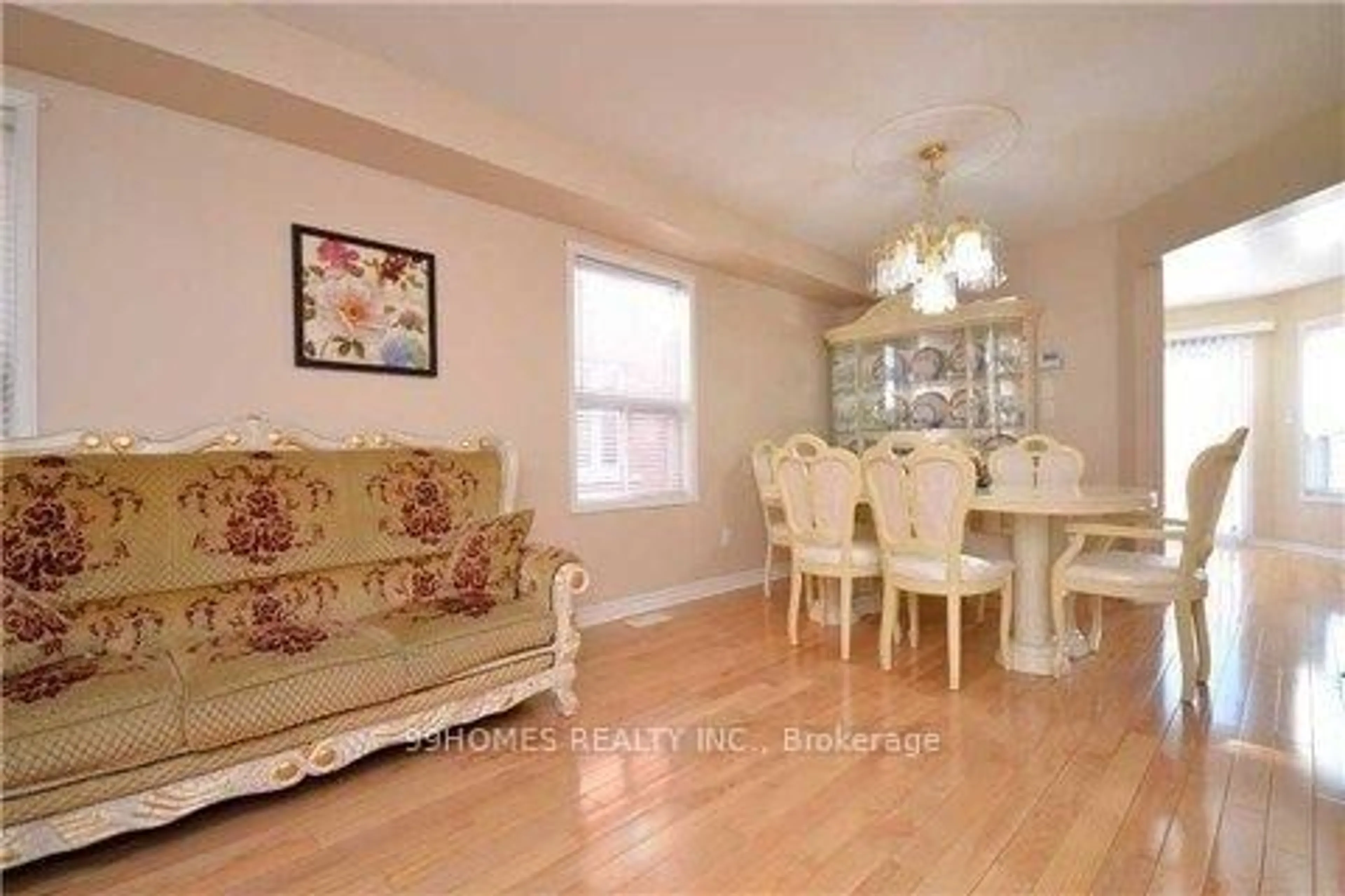 Dining room, wood/laminate floor for 49 Olympia Cres, Brampton Ontario L6X 4W2
