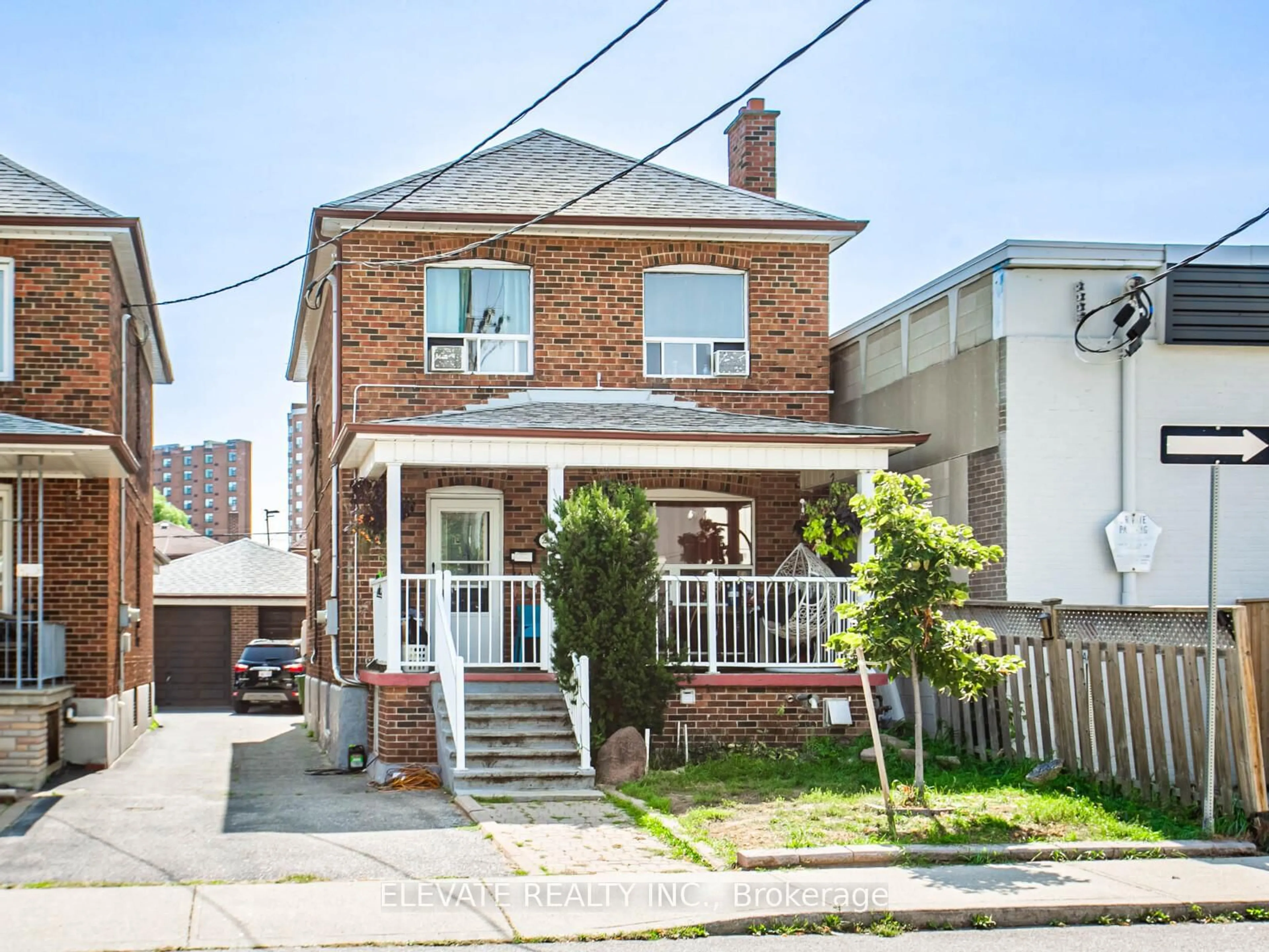 Home with brick exterior material, street for 247 Belgravia Ave, Toronto Ontario M6E 2M9