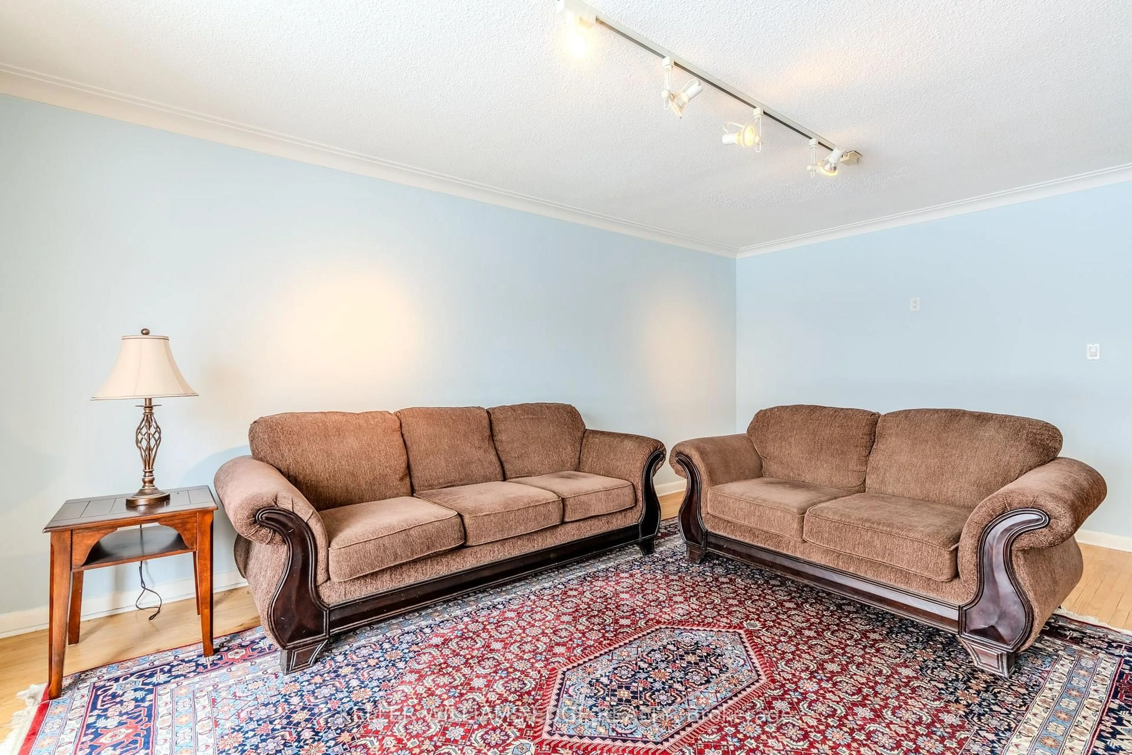 Living room with furniture, carpet floor for 57 Apted Ave, Toronto Ontario M9L 2P2